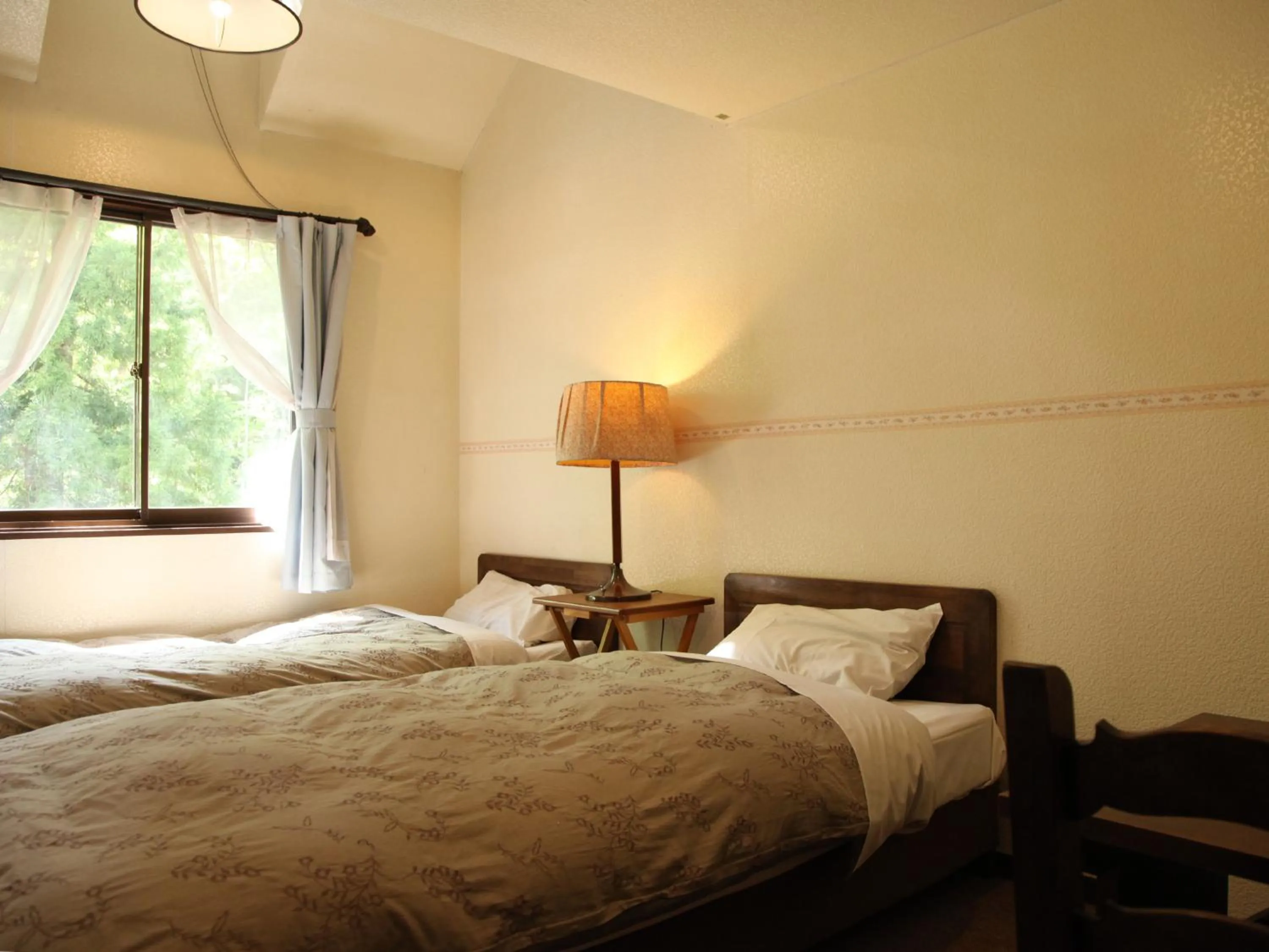 Photo of the whole room, Bed in Garden Pension Obergurgl