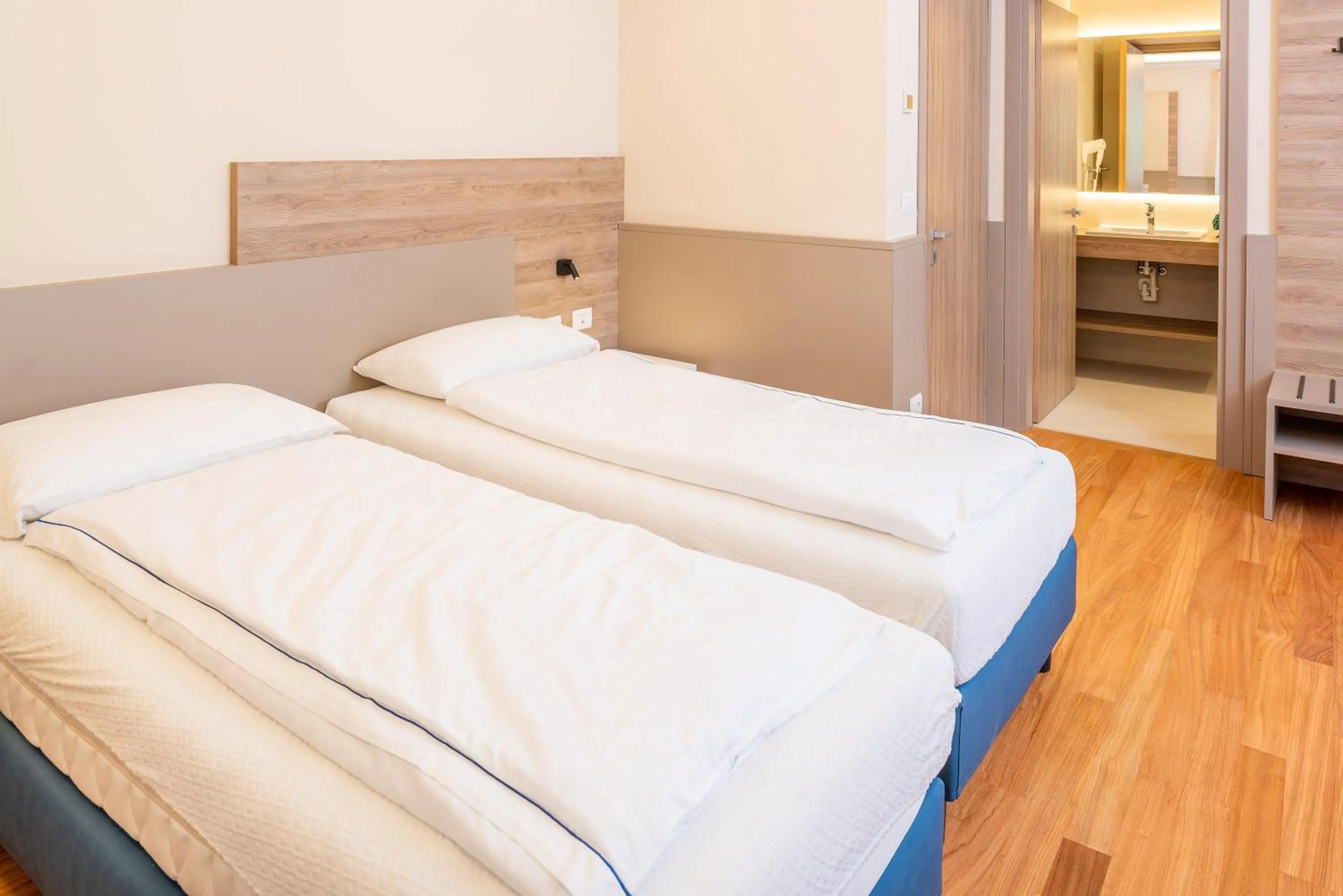Bed in Sporthotel Olimpo