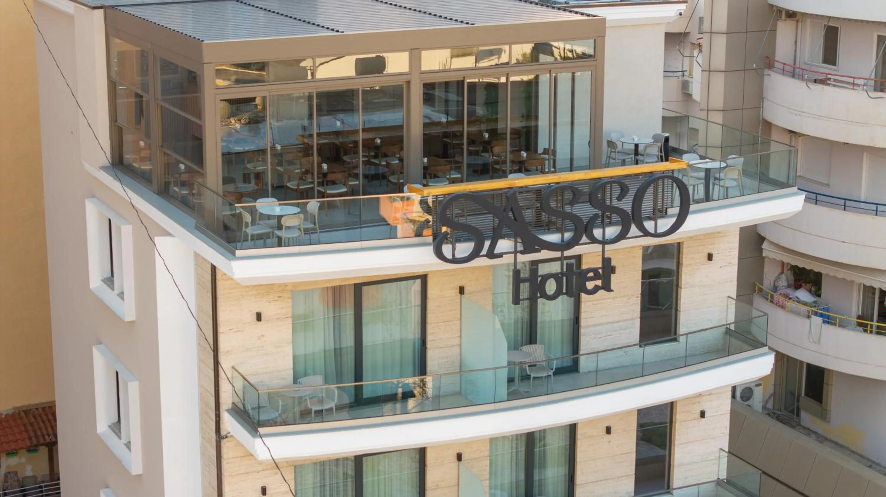 Communal lounge/ TV room in SASSO Hotel