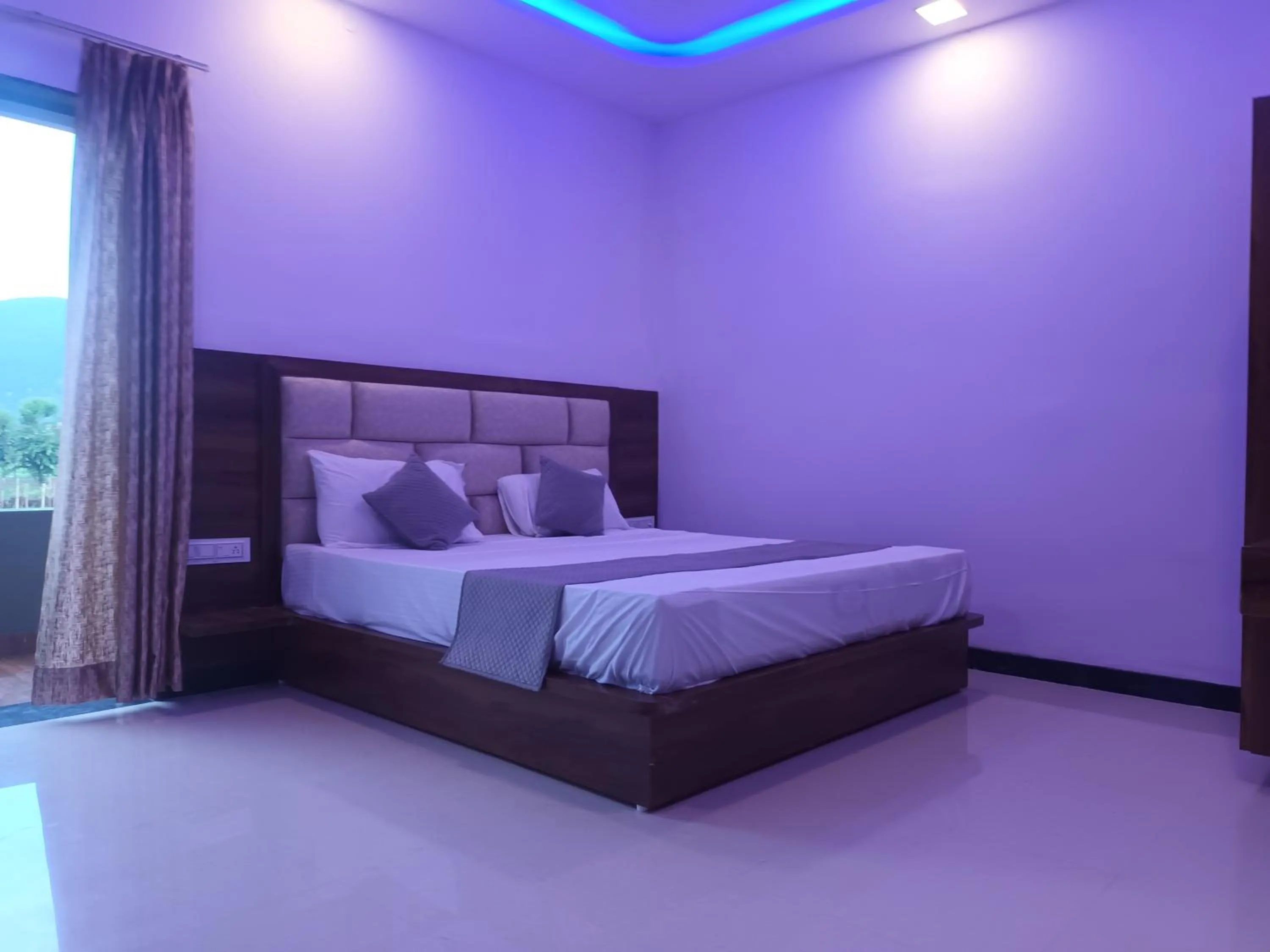 Bed in Braham Vatika Resort