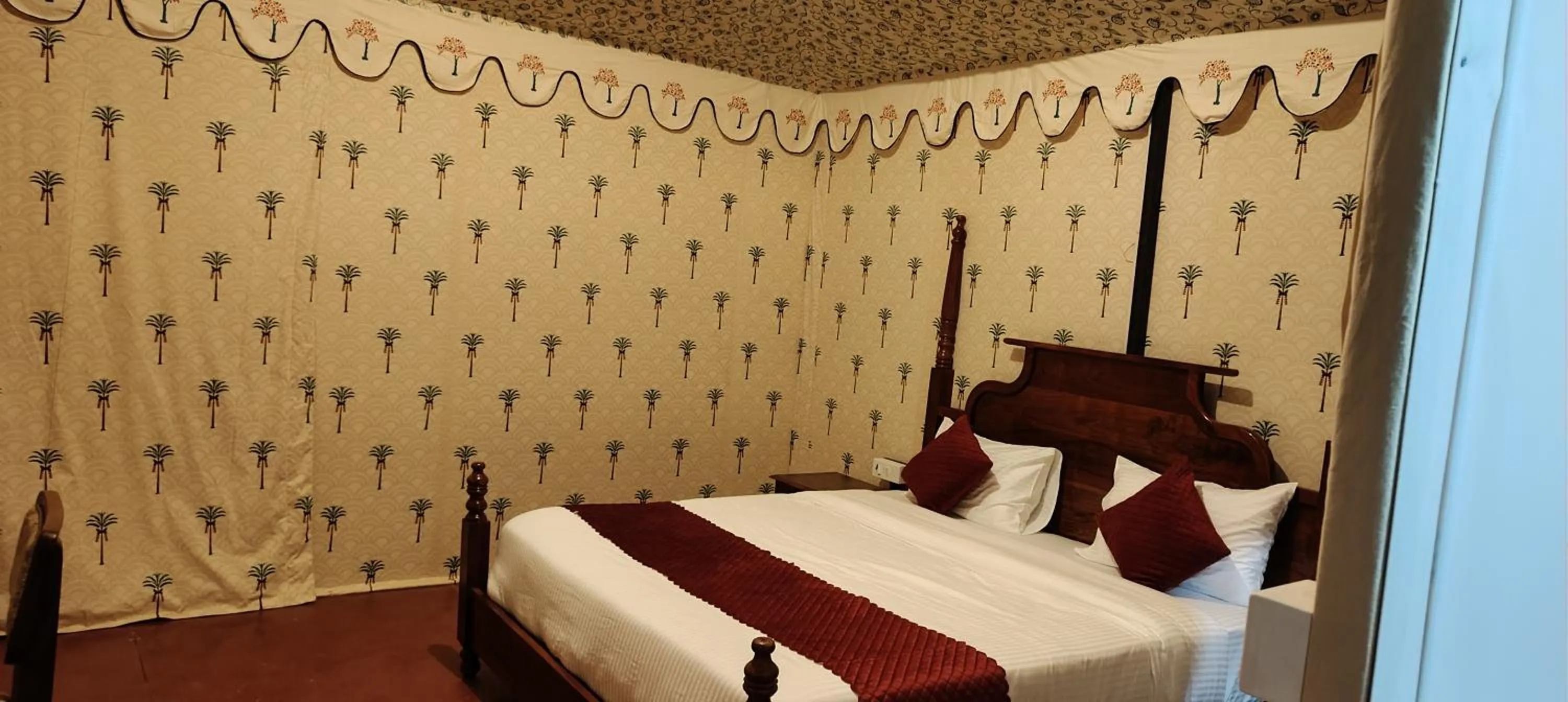 Bed in Braham Vatika Resort