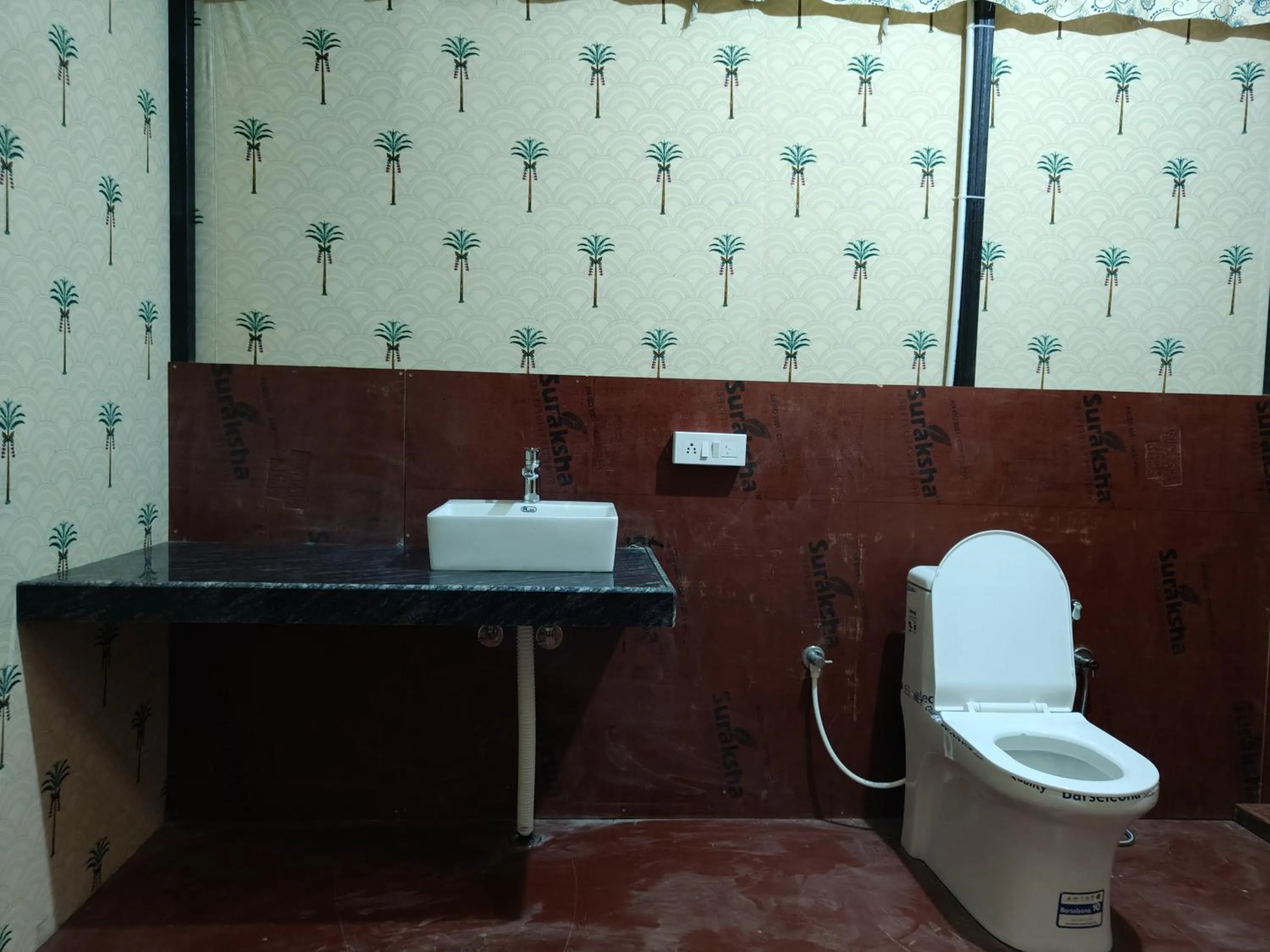 Toilet in Braham Vatika Resort