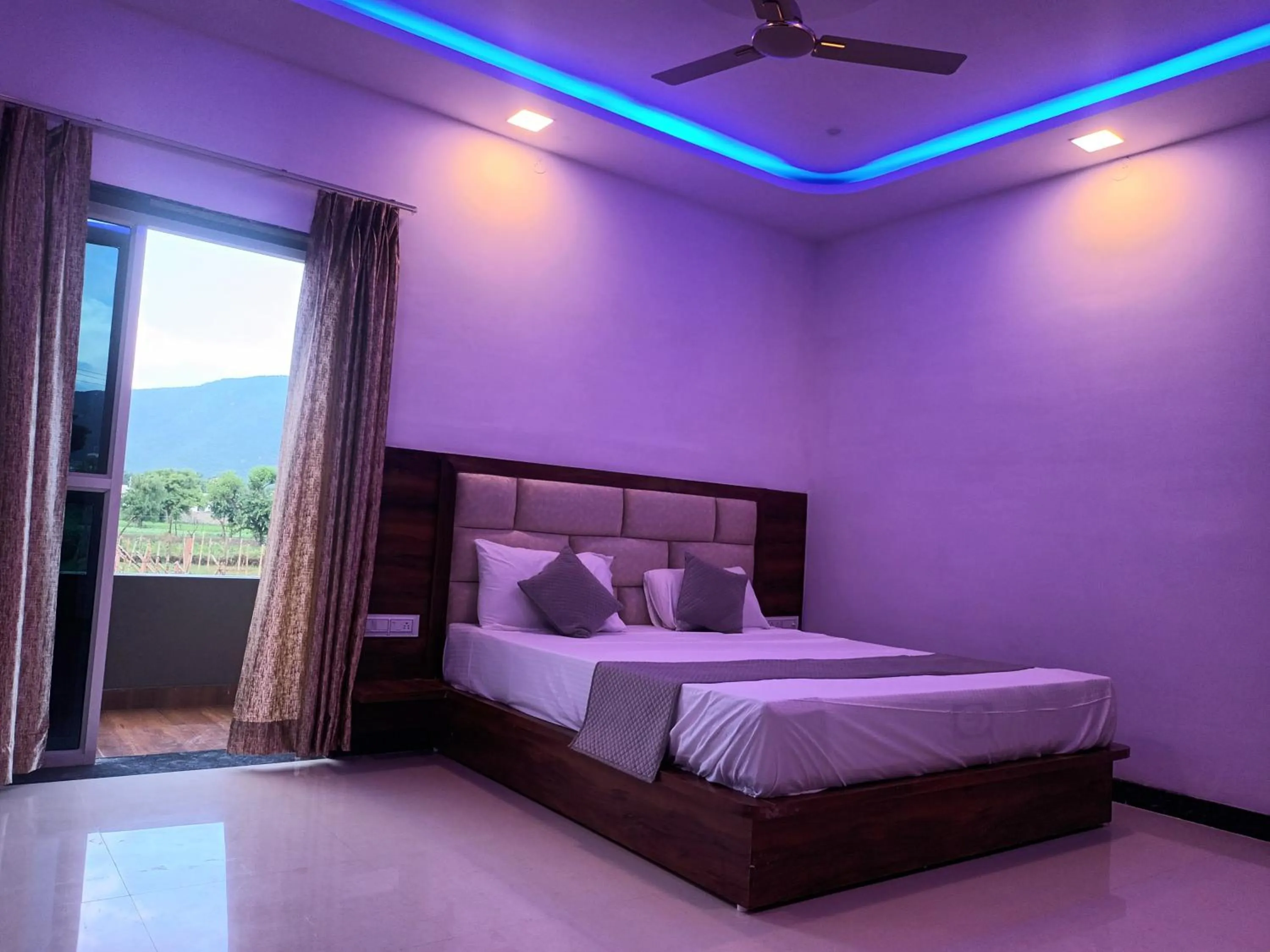 Bed in Braham Vatika Resort