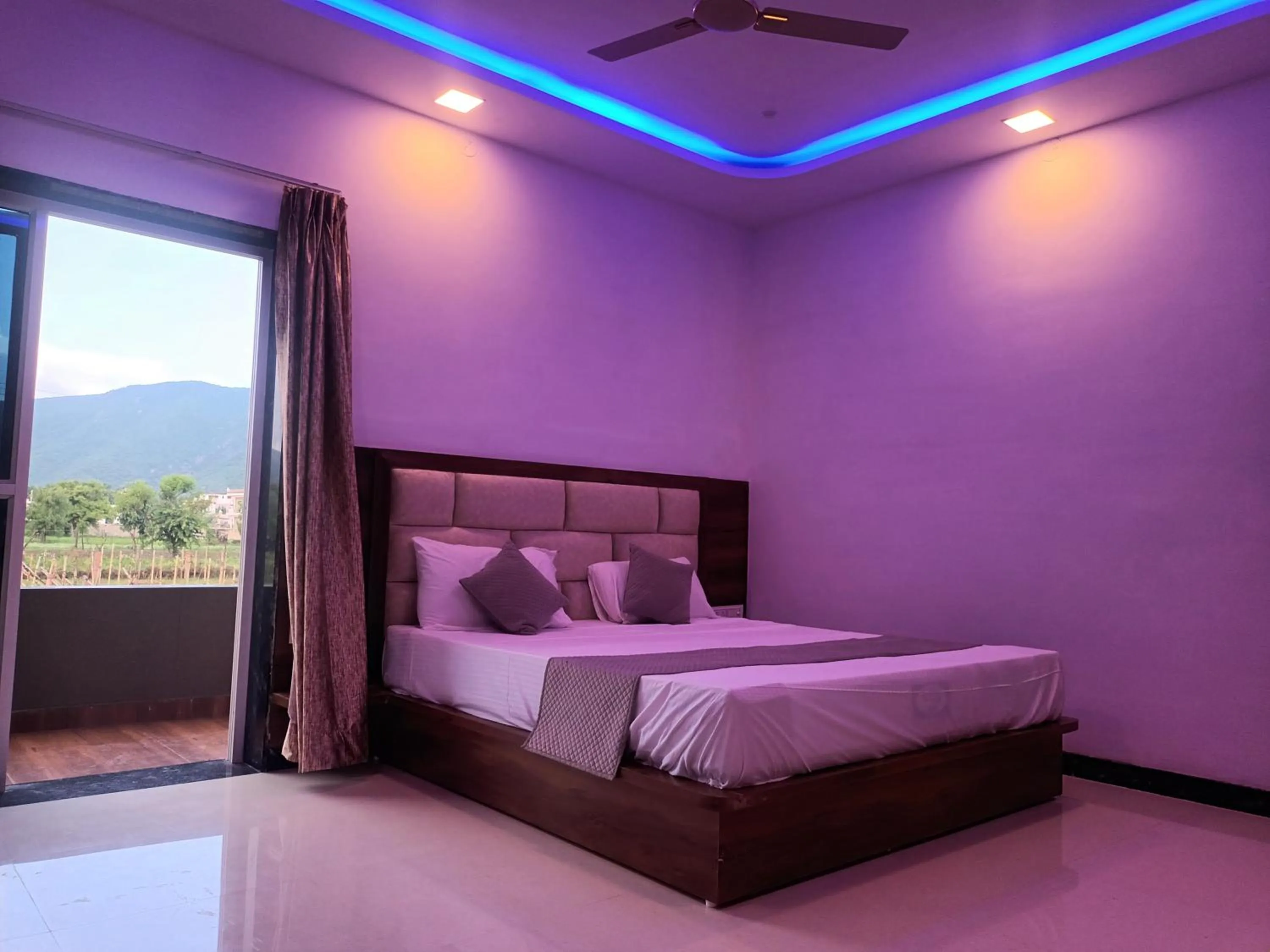 Bed in Braham Vatika Resort