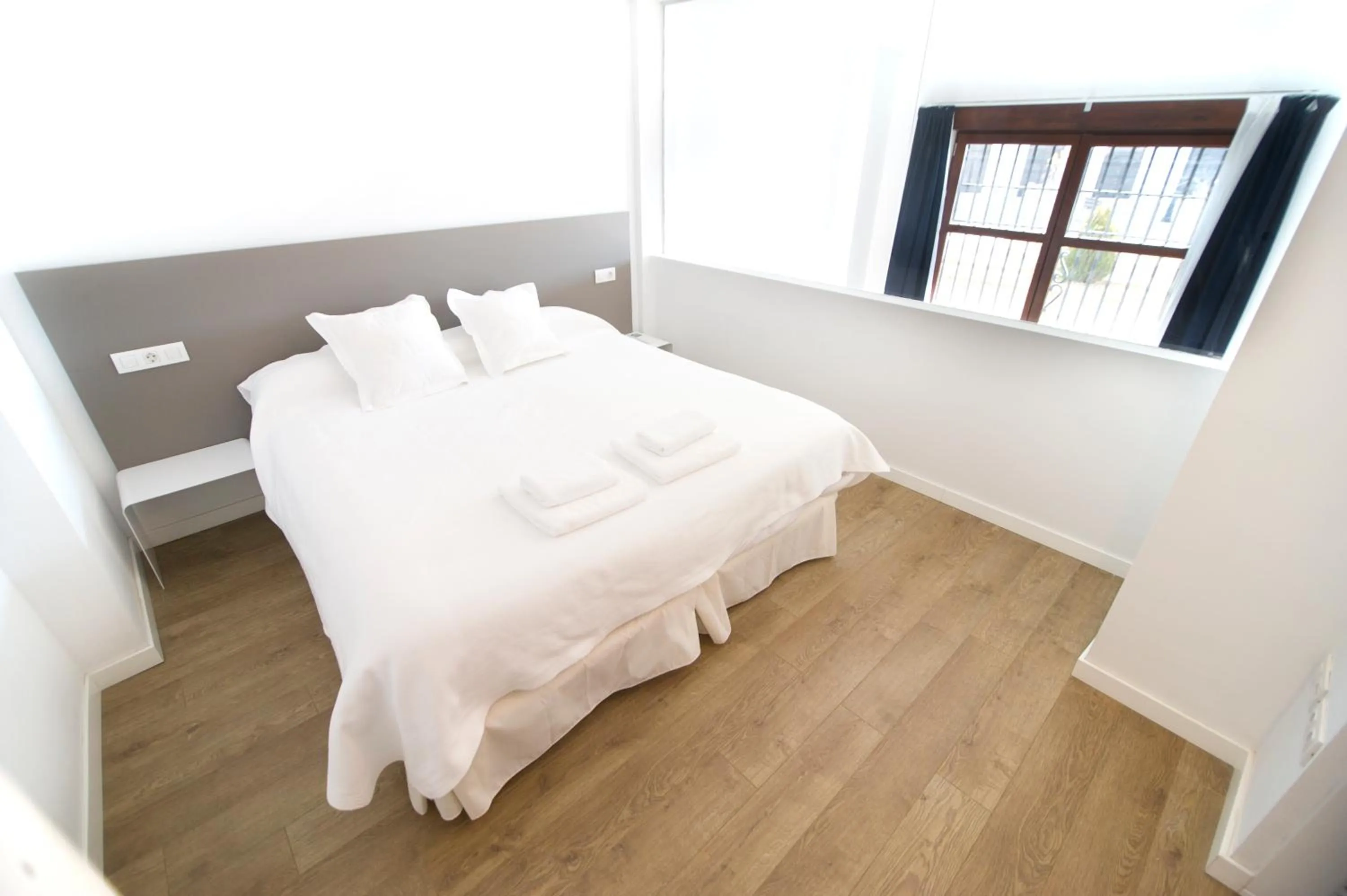 Bed in Smart Suites Albaicin