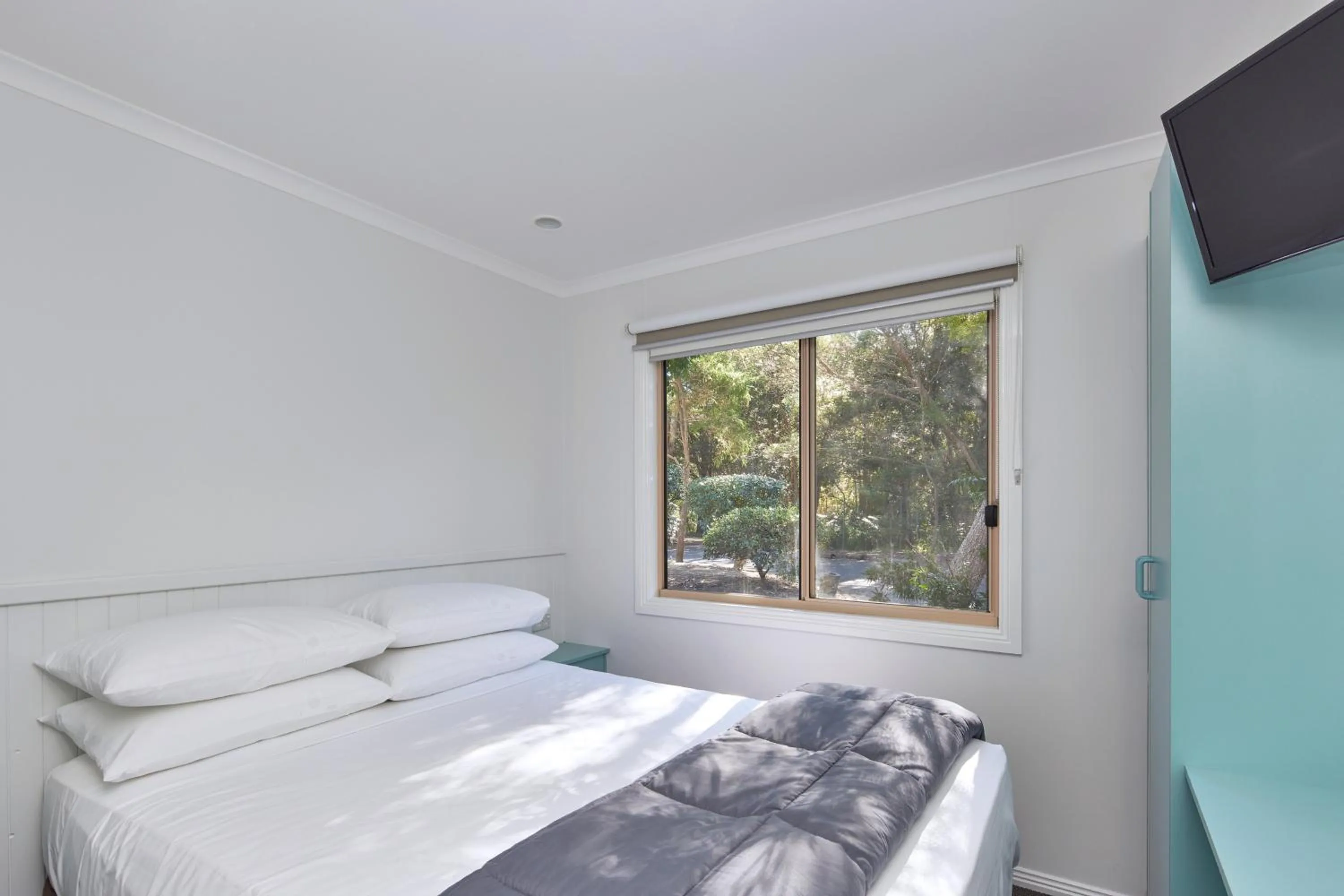 Bed in NRMA Ocean Beach Holiday Resort