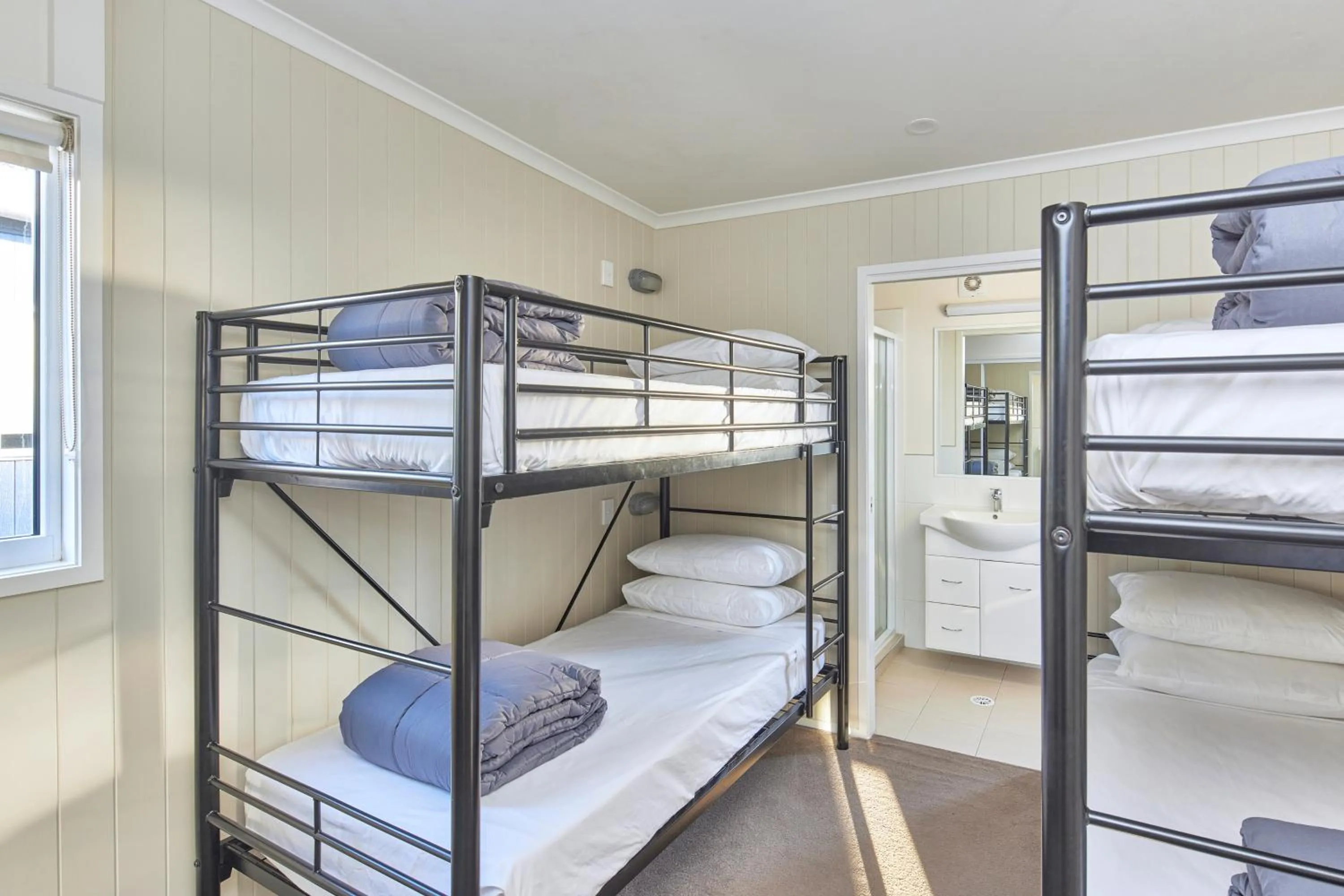 Bed in NRMA Ocean Beach Holiday Resort