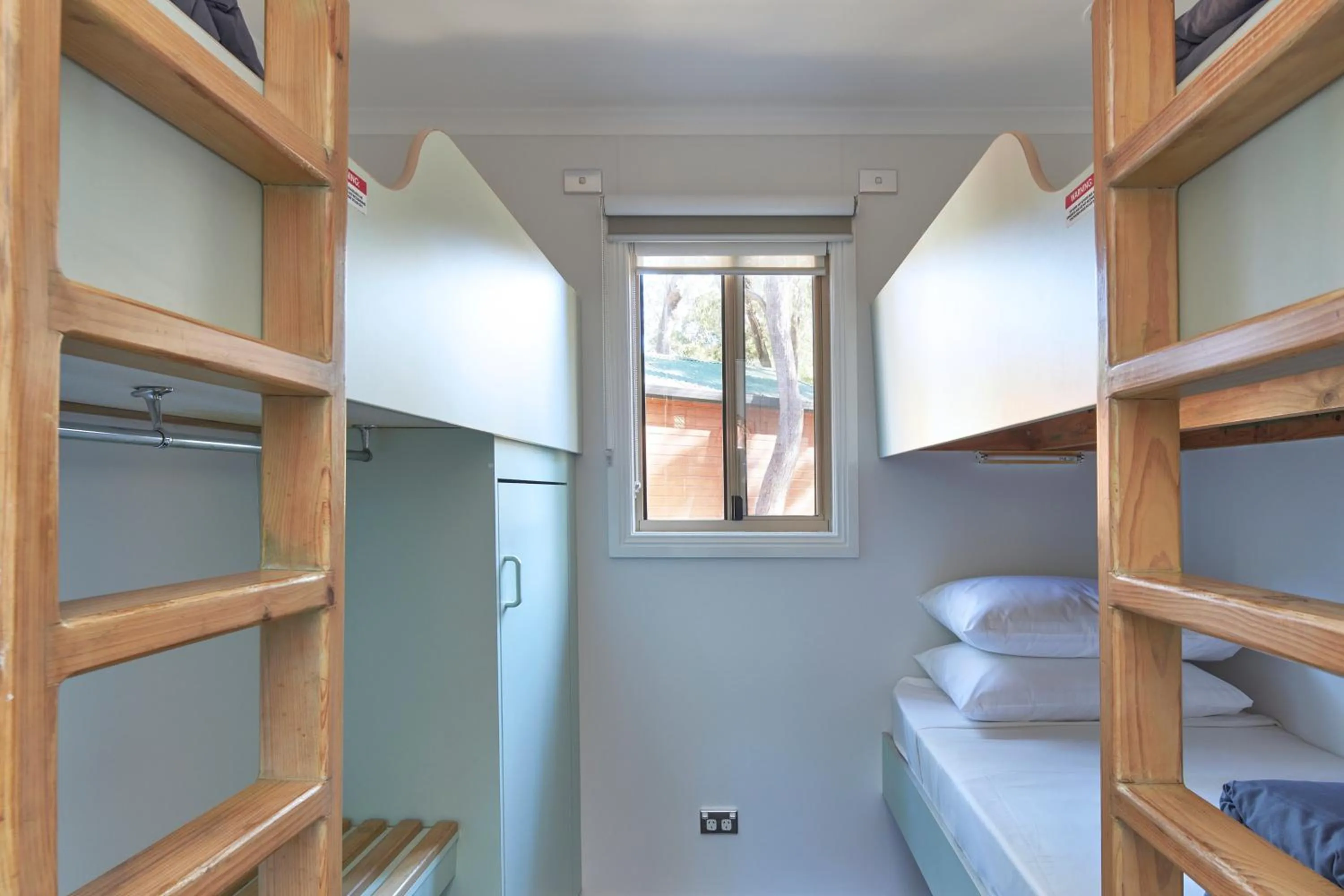 Bed in NRMA Ocean Beach Holiday Resort