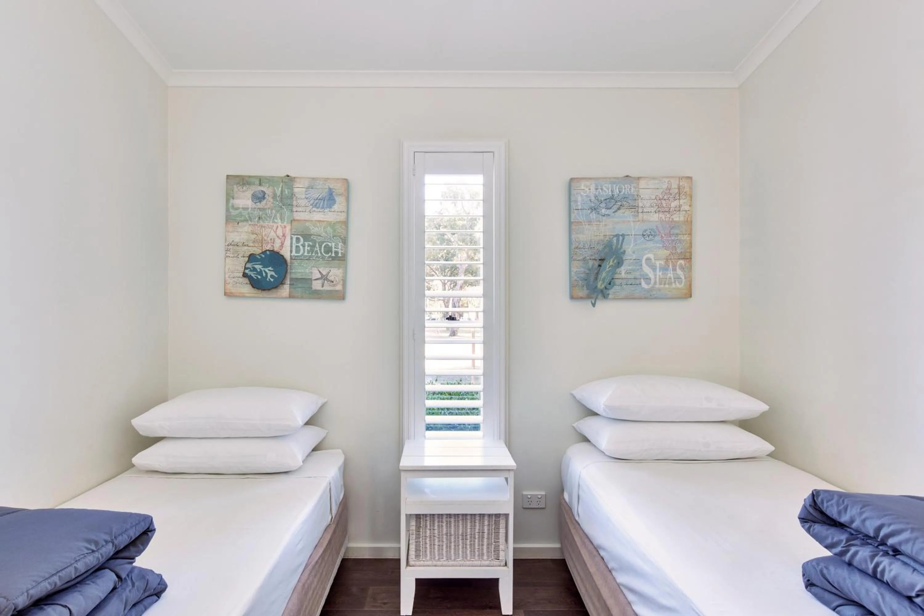 Bed in NRMA Ocean Beach Holiday Resort