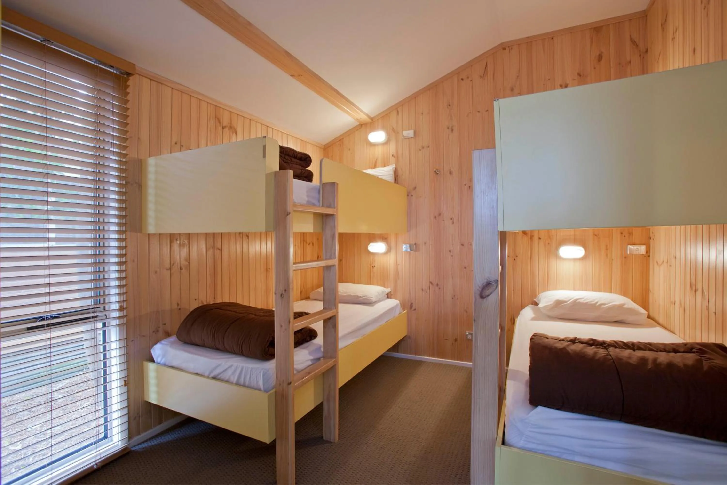 Bed in NRMA Ocean Beach Holiday Resort