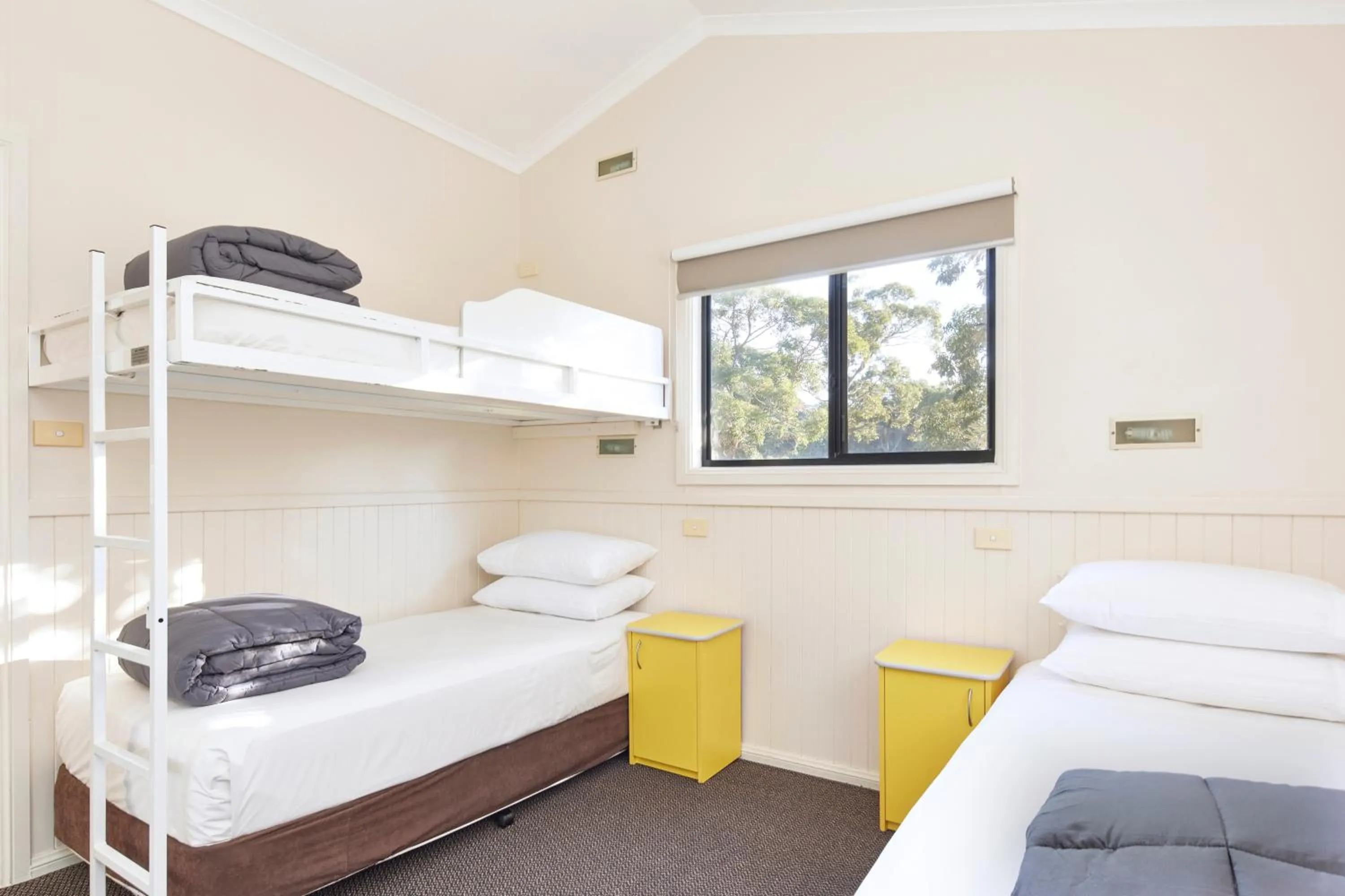 Bed in NRMA Ocean Beach Holiday Resort