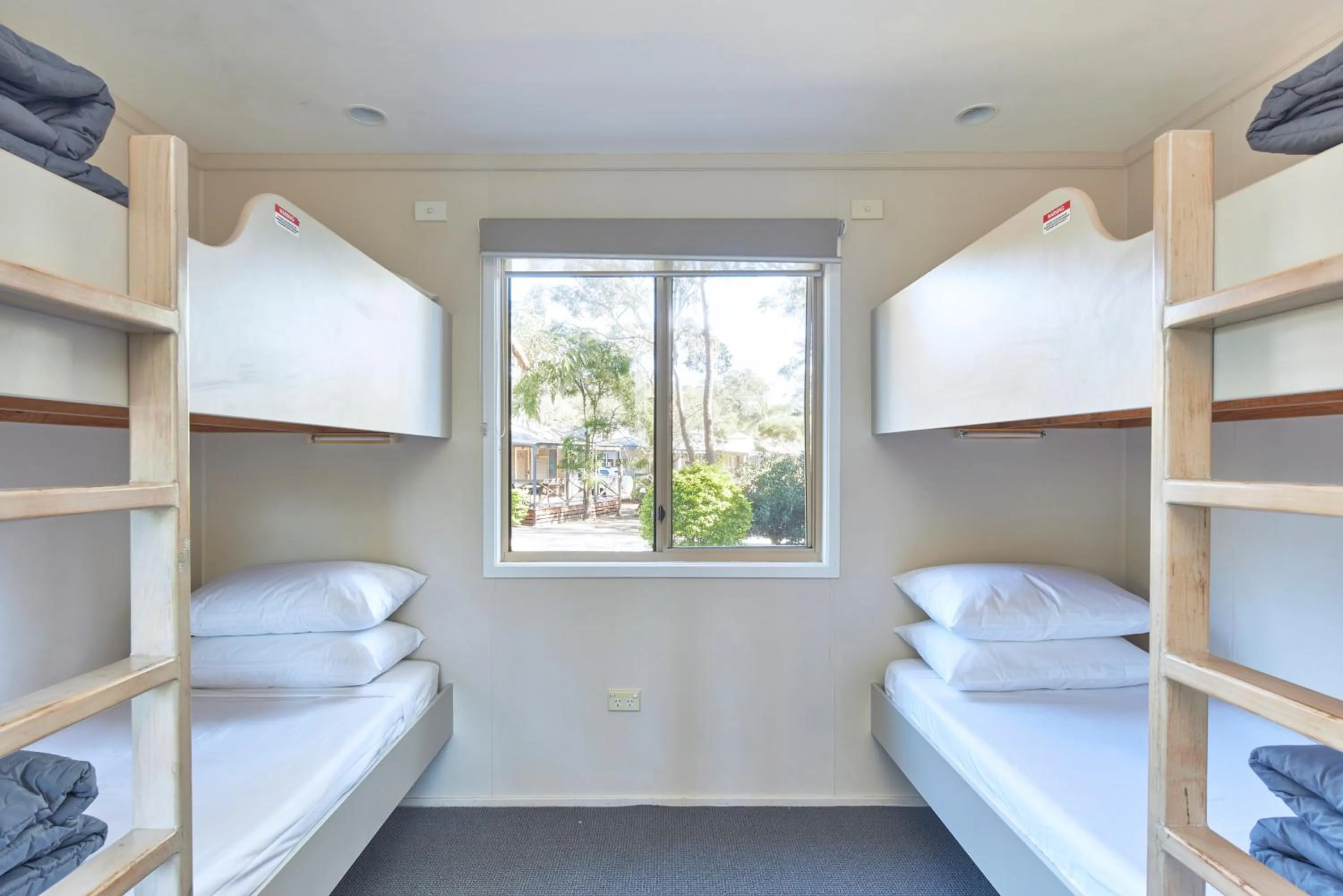 Bed in NRMA Ocean Beach Holiday Resort