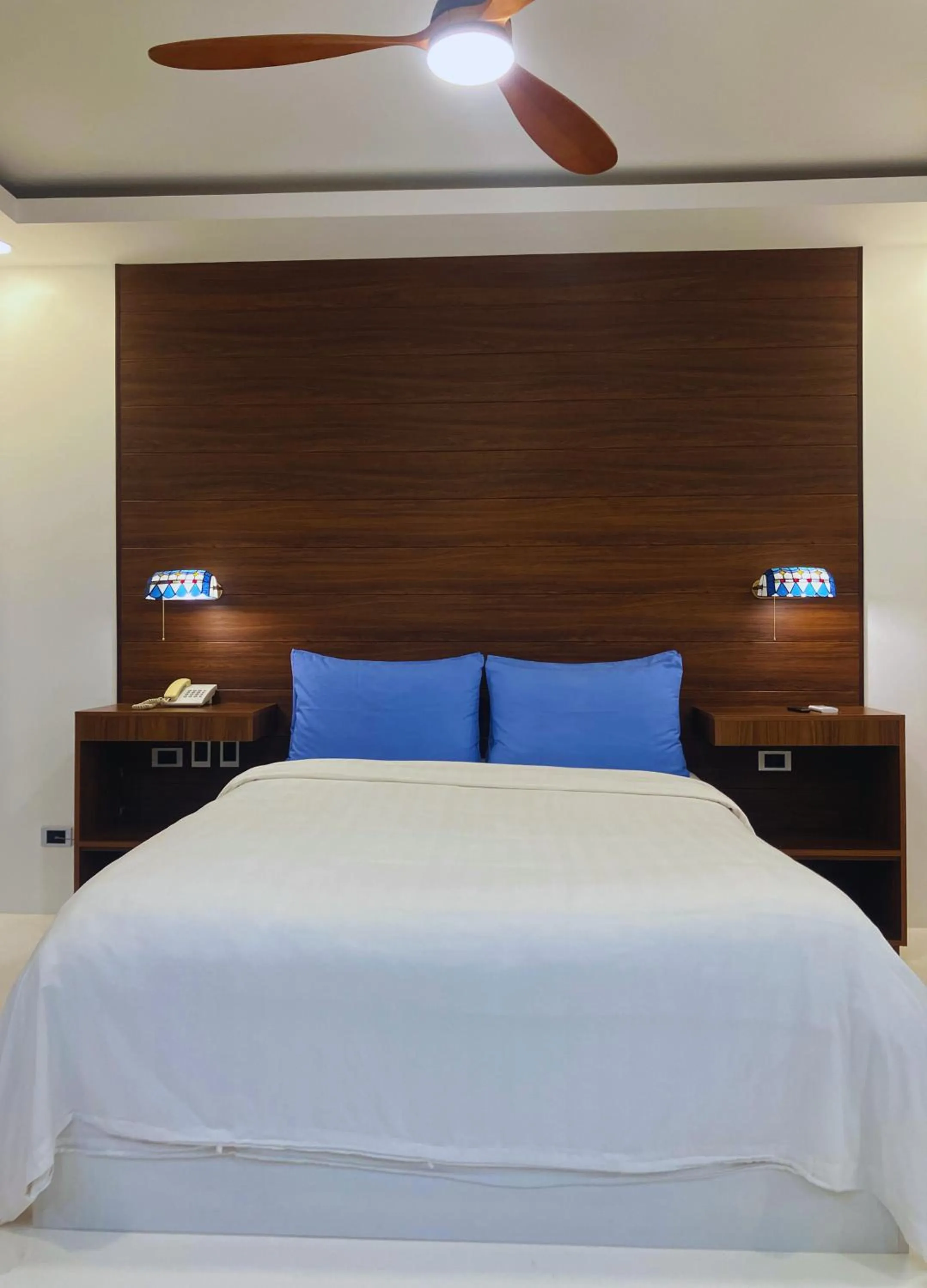 Bed in Buena Casa Hotel