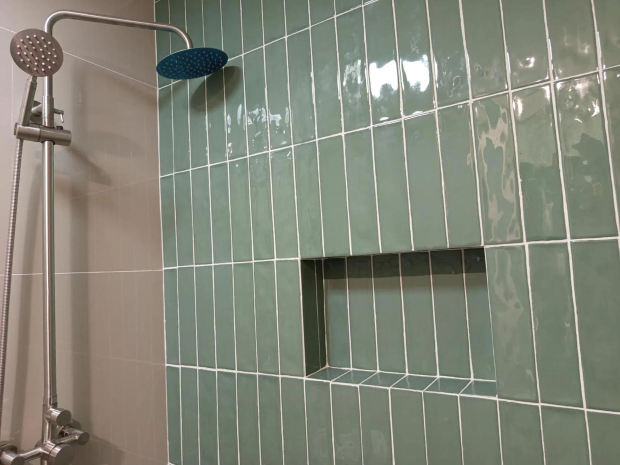 Shower in Buena Casa Hotel