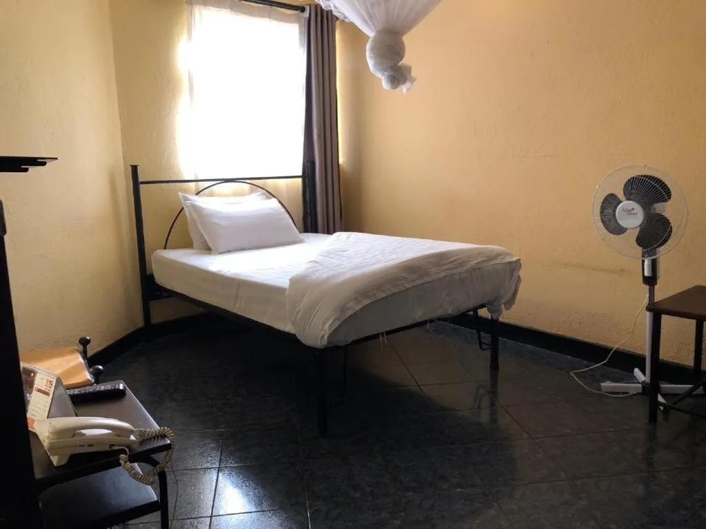 Bed in Meley Impala Hotel