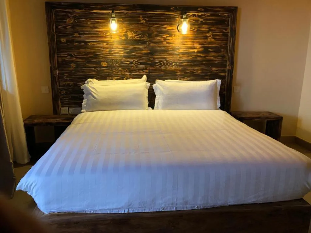 Bed in Meley Impala Hotel