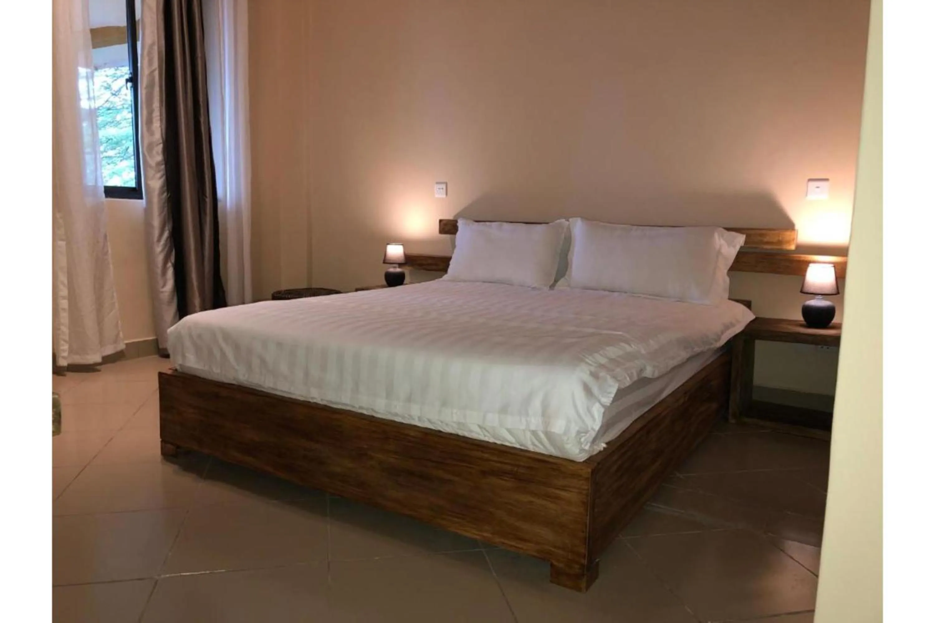 Bed in Meley Impala Hotel