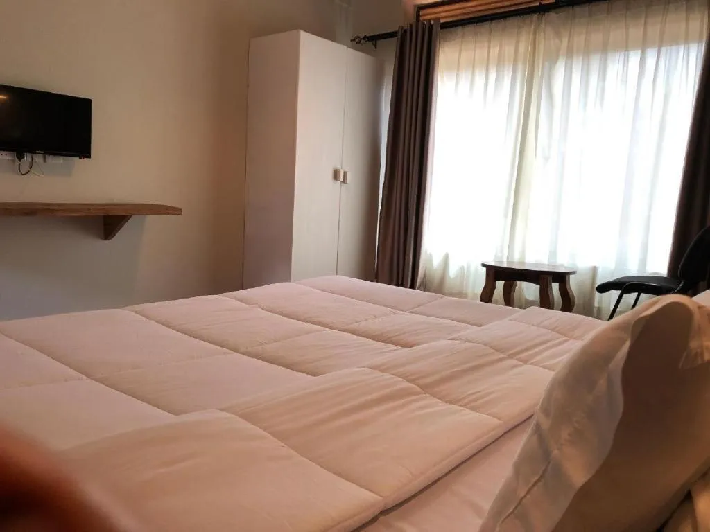 Bed in Meley Impala Hotel