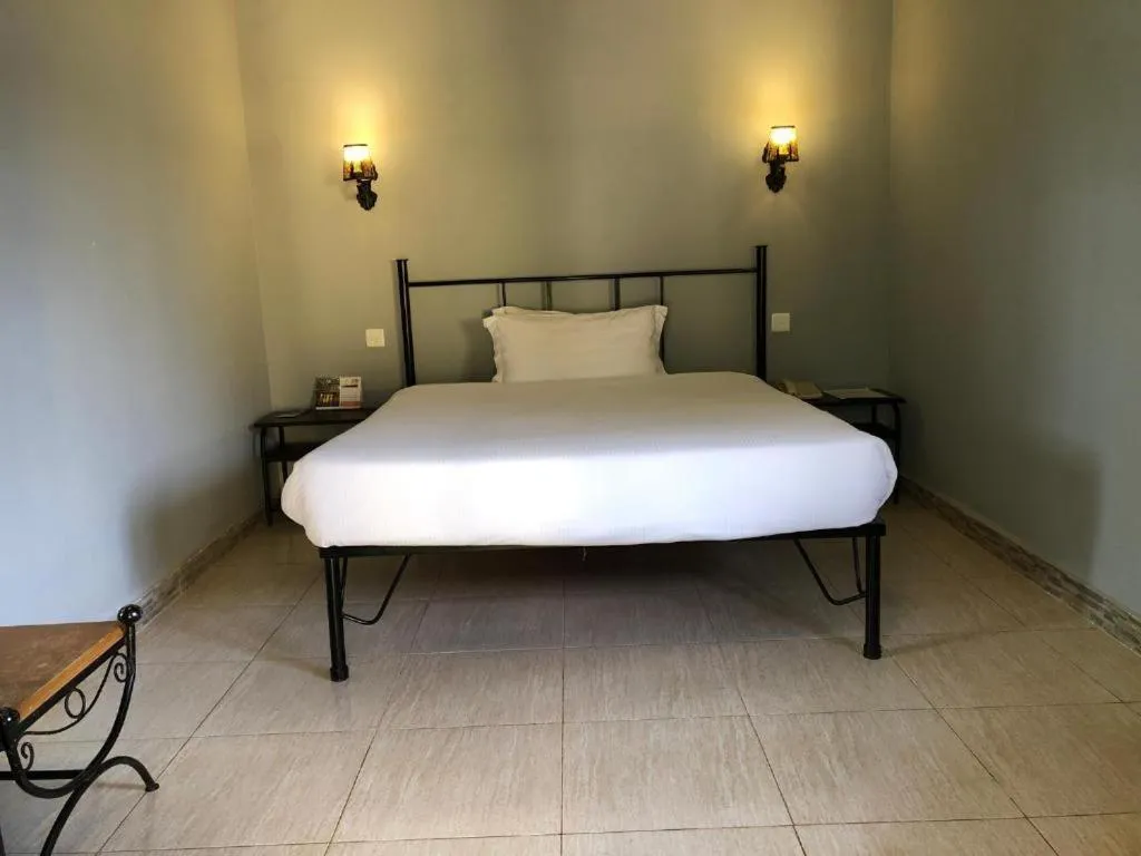 Bed in Meley Impala Hotel