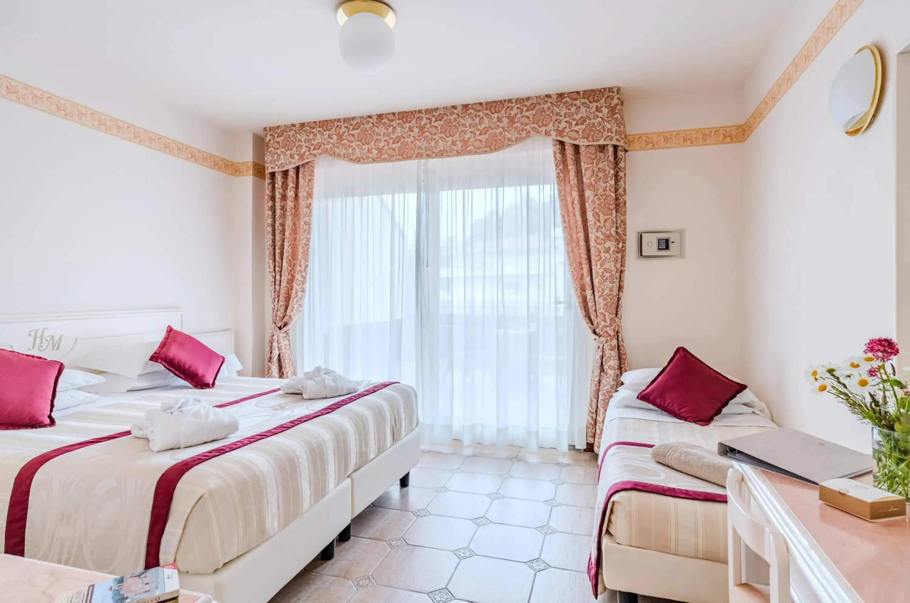 Classic Triple Room in Hotel Miramonti Classic Triple Room in Hotel Miramonti