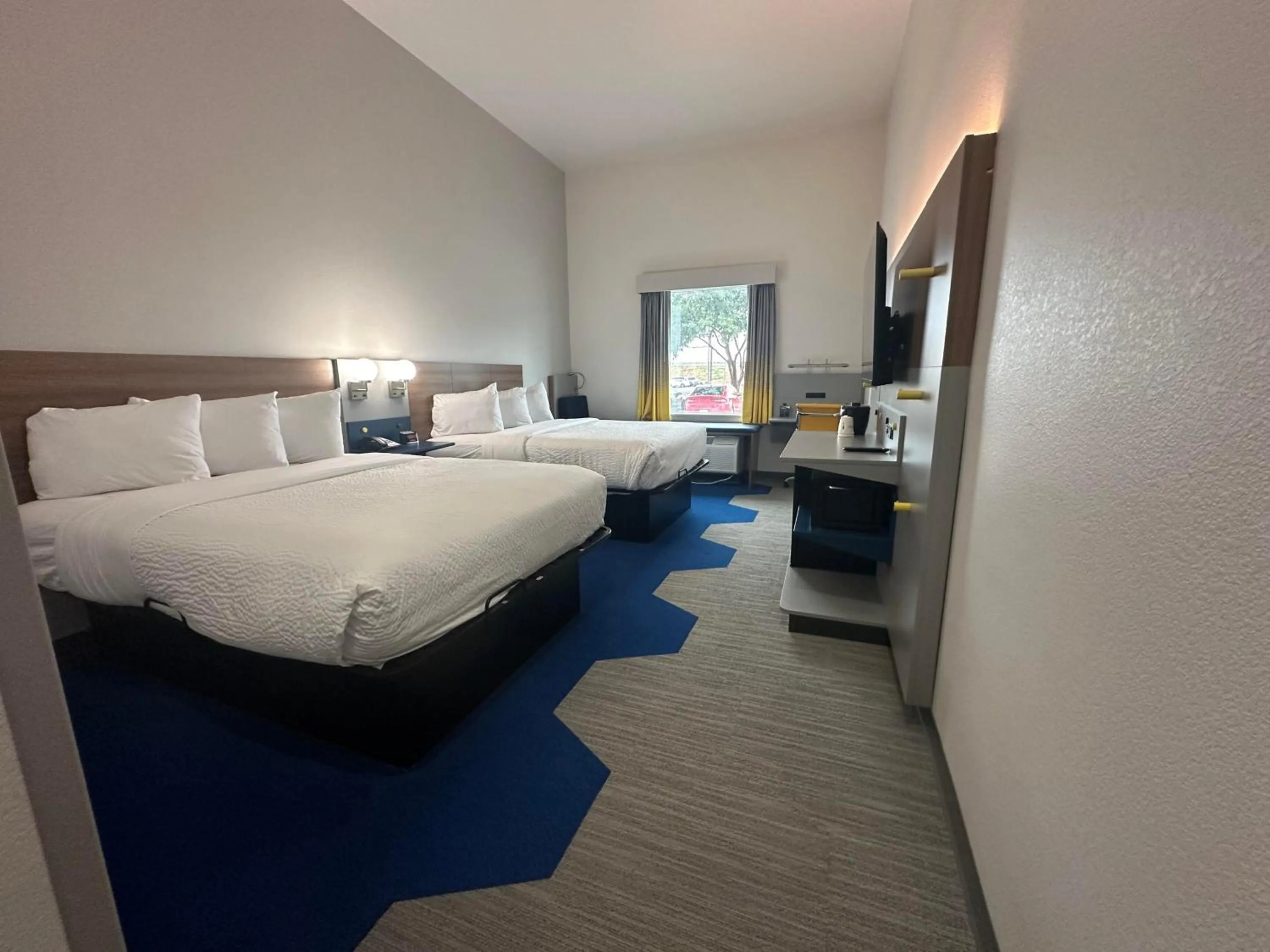 Photo of the whole room, Bed in Microtel Inn & Suites by Wyndham Amarillo West