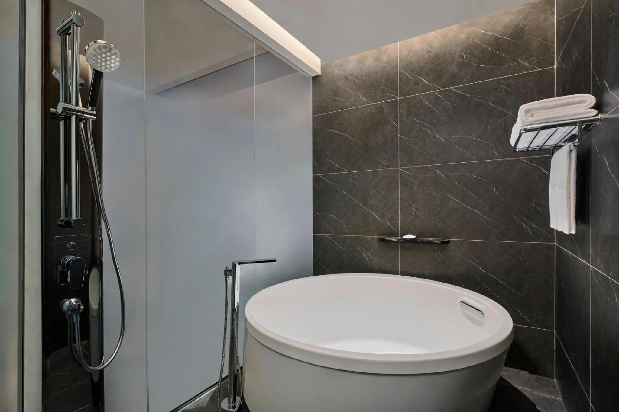 Bathroom in Crowne Plaza Shanghai Snow World by IHG