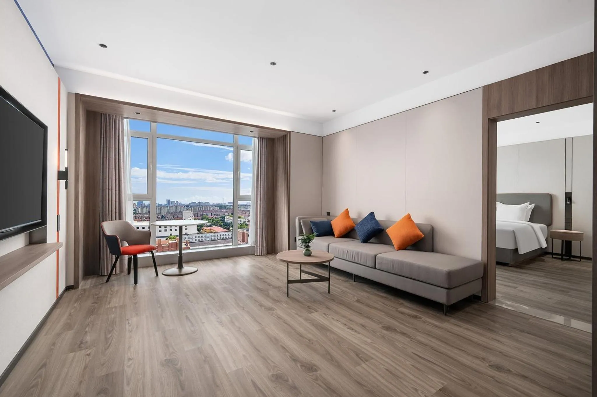 Photo of the whole room in Holiday Inn Express Qingdao Hongdao Station by IHG - Qingdao International Airport