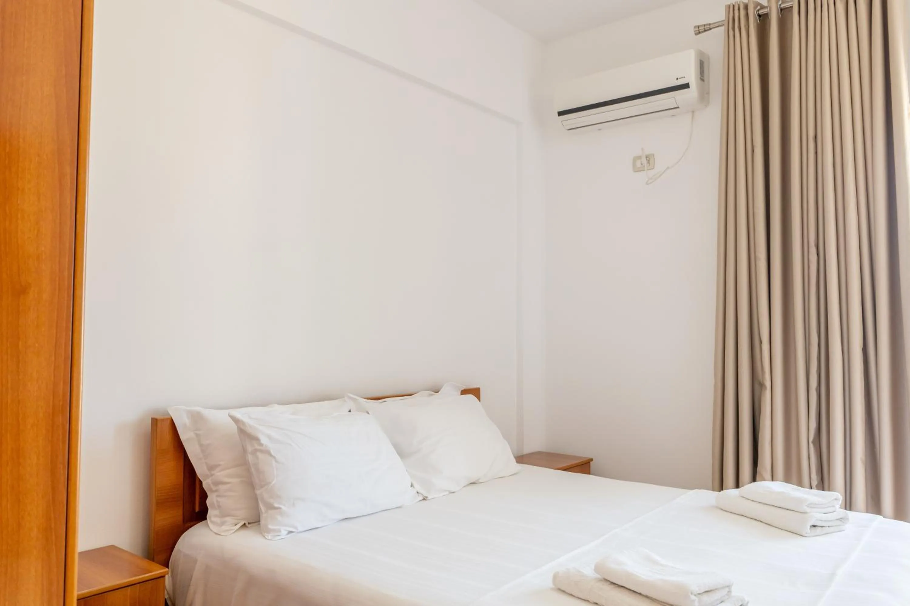 Bed in Aleksander ApartHotel