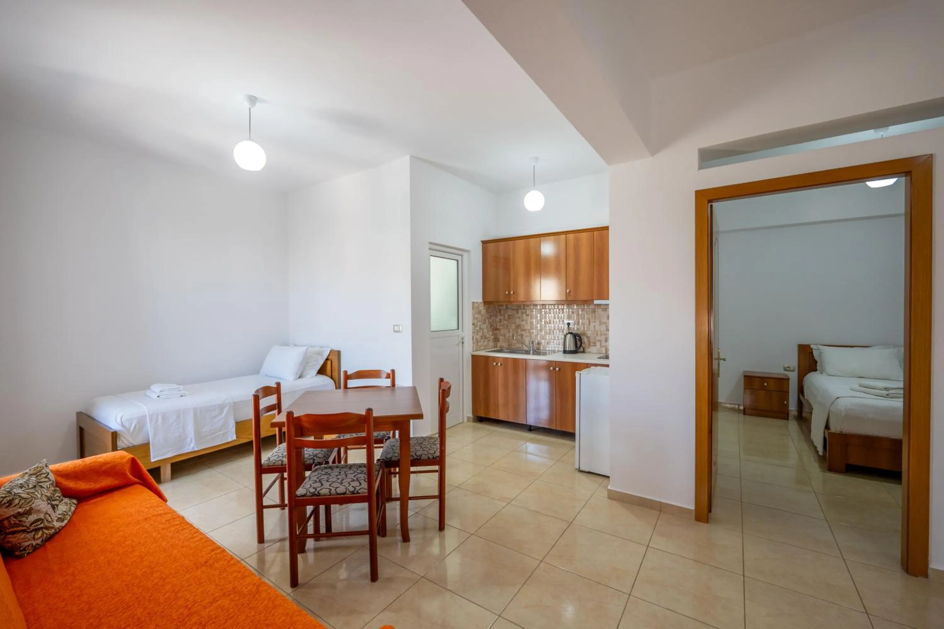 Kitchen or kitchenette, Bed in Aleksander ApartHotel