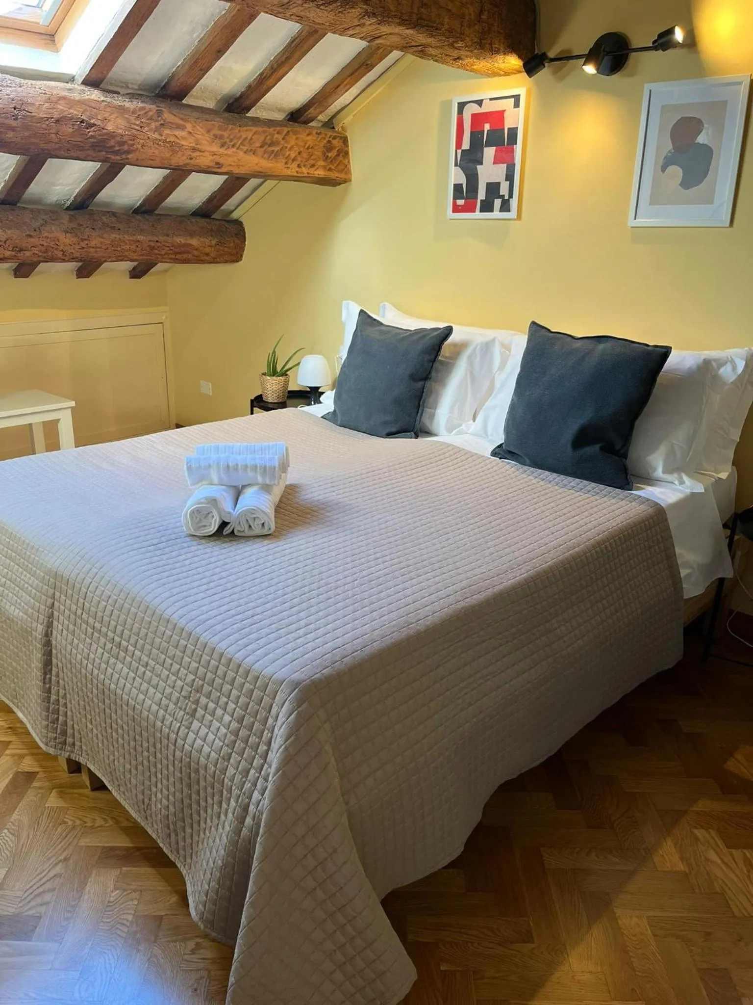 Bed in Apartment Hotel Marchesini