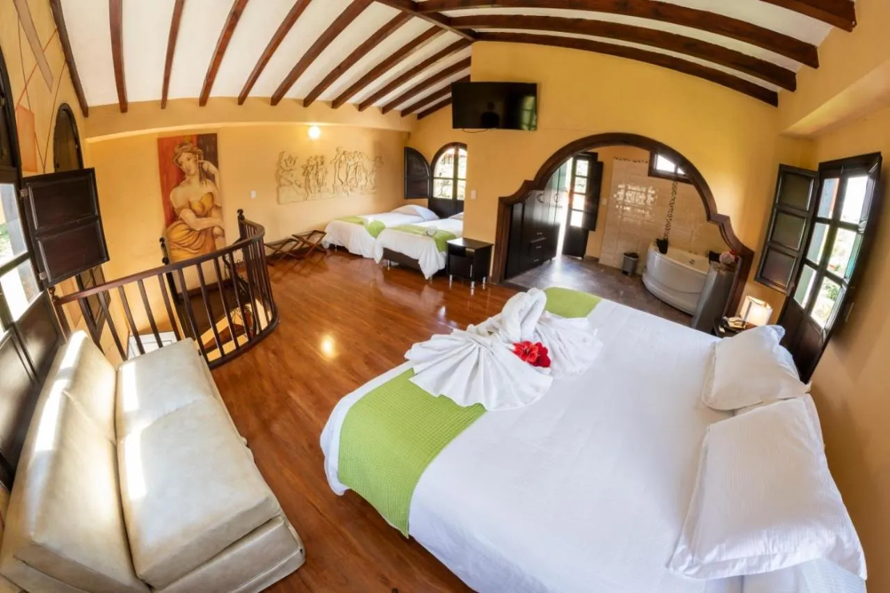 Bed in San Agustin Internacional Hotel