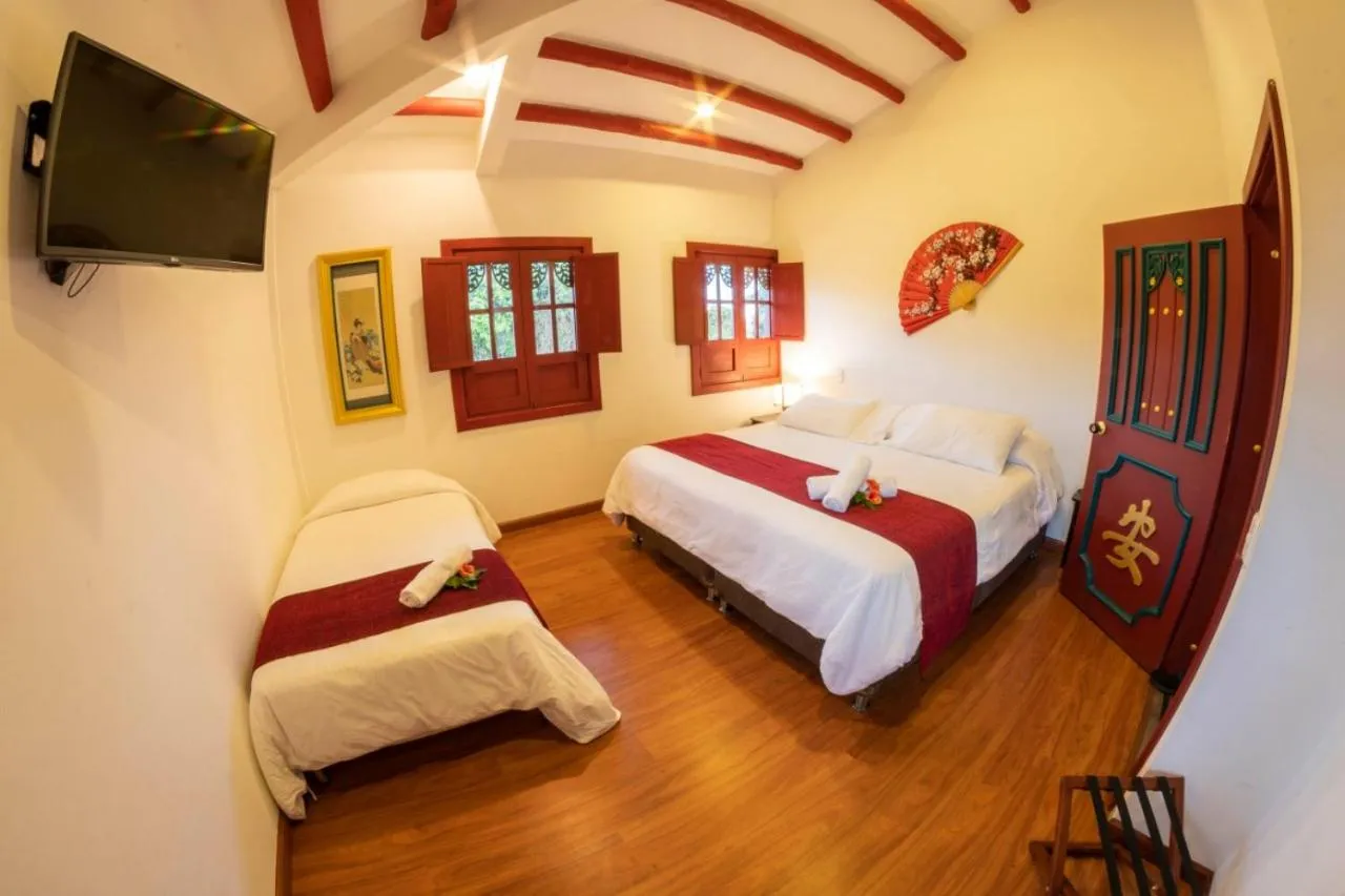 Bed in San Agustin Internacional Hotel