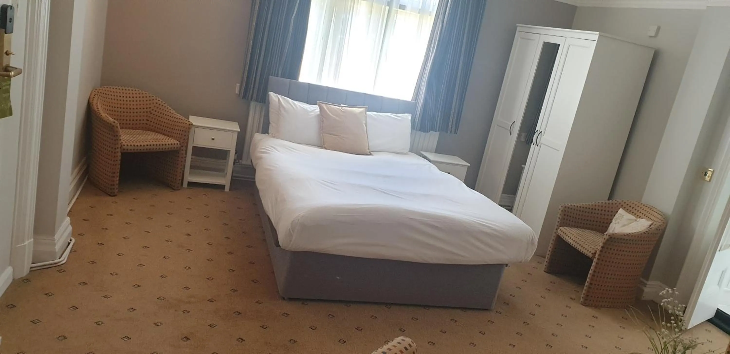 Bed in The Tudor Hotel