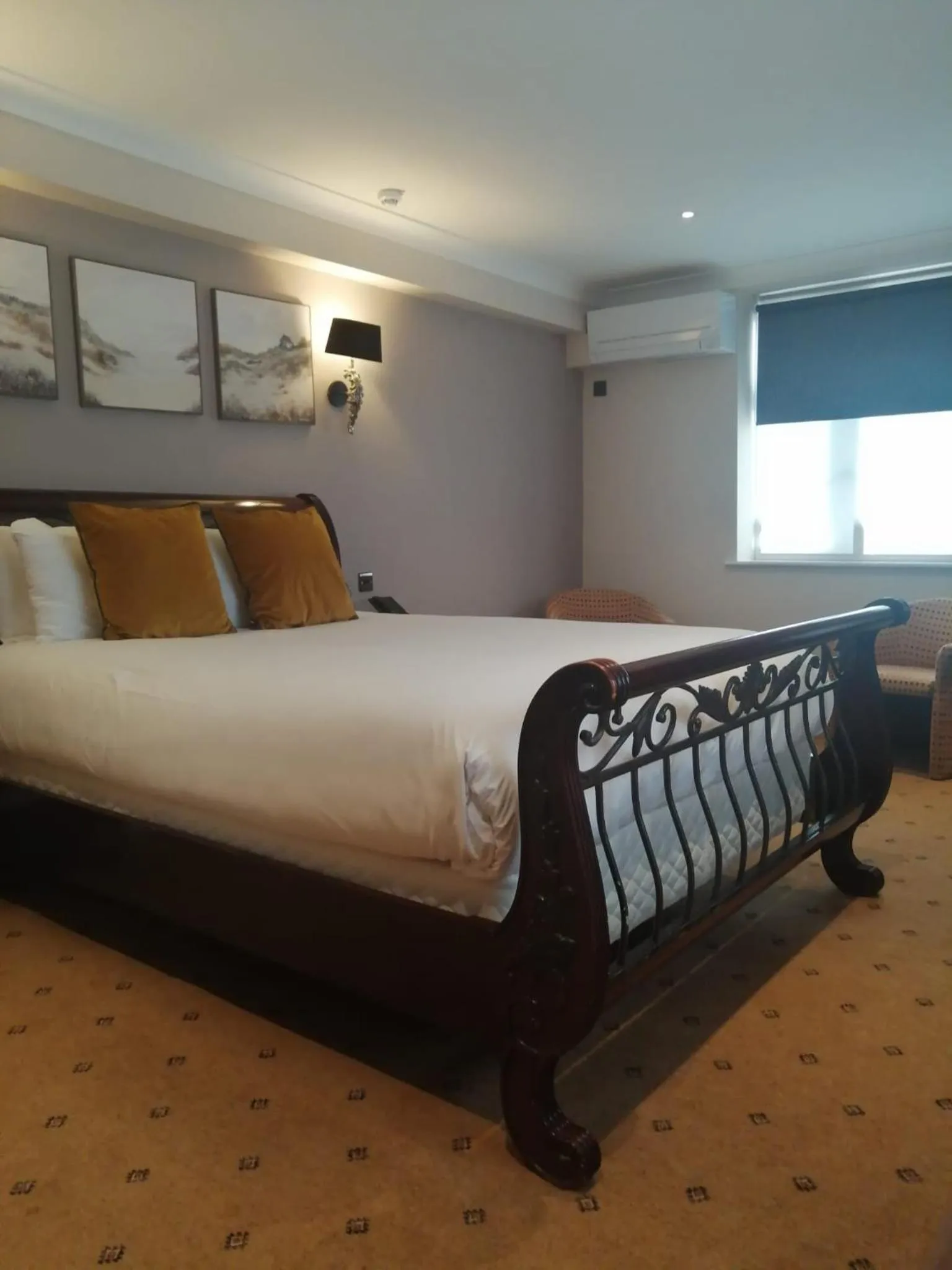 Bed in The Tudor Hotel