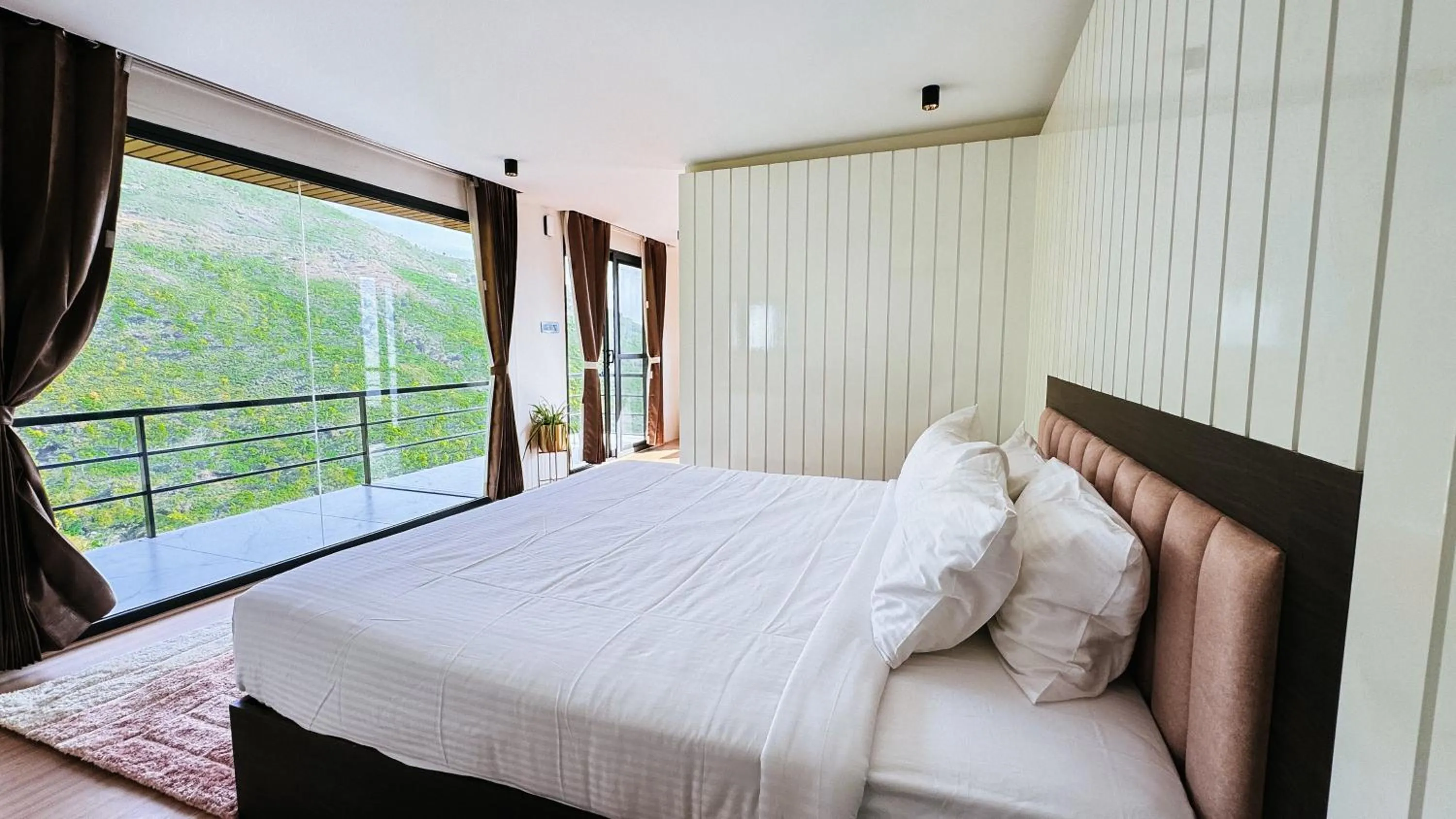 Bed in Tomorrowland Farms and Suites