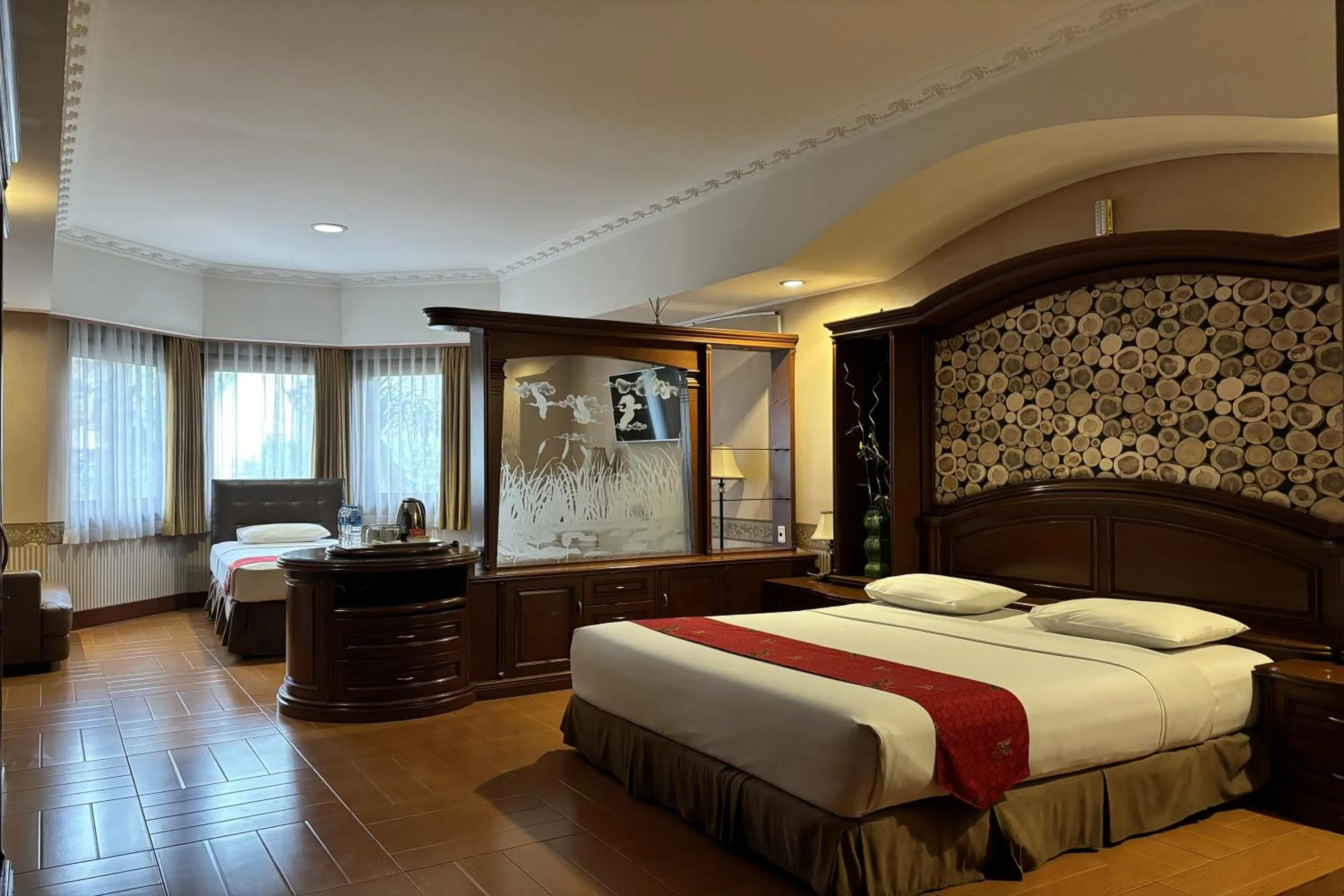 Bed in Hotel Pesona Bamboe Lembang