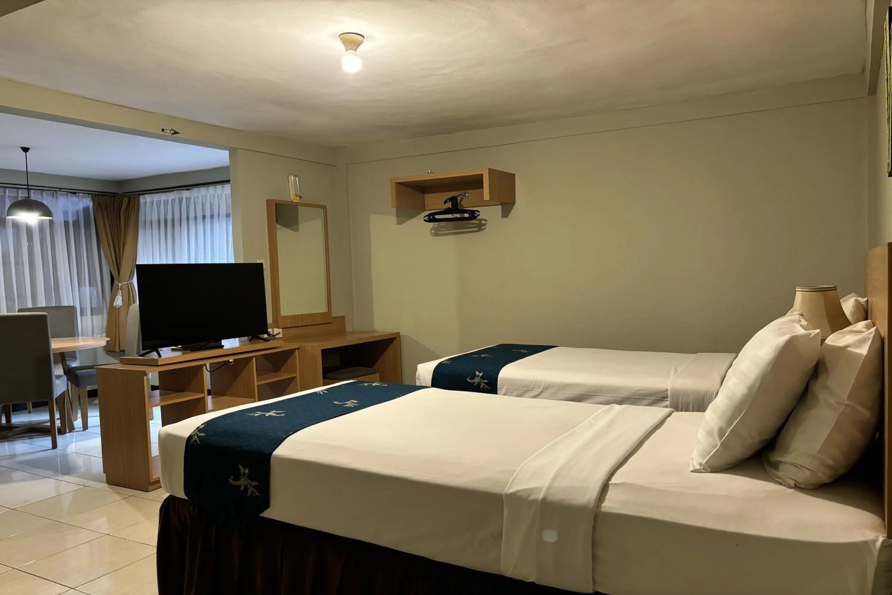 Bed in Hotel Pesona Bamboe Lembang