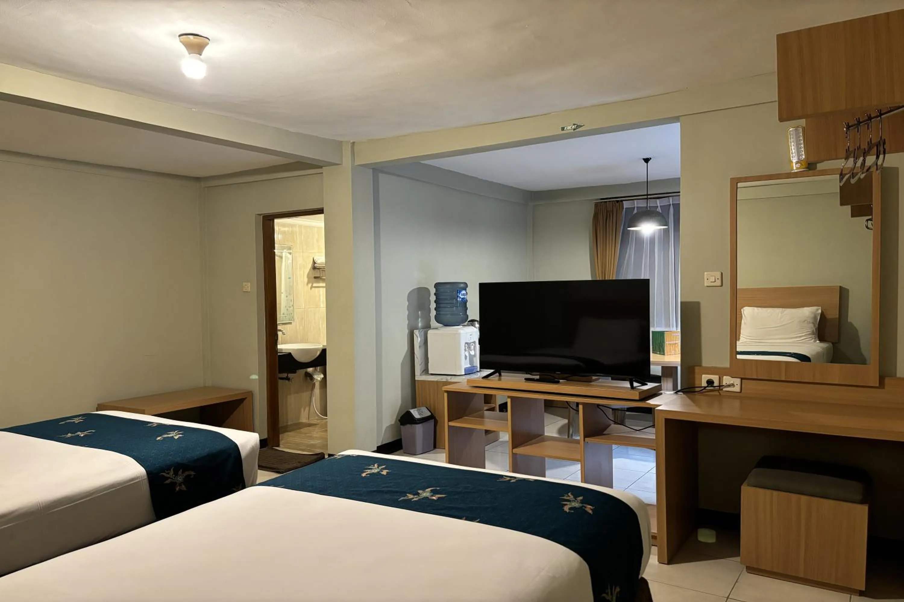 Bed in Hotel Pesona Bamboe Lembang