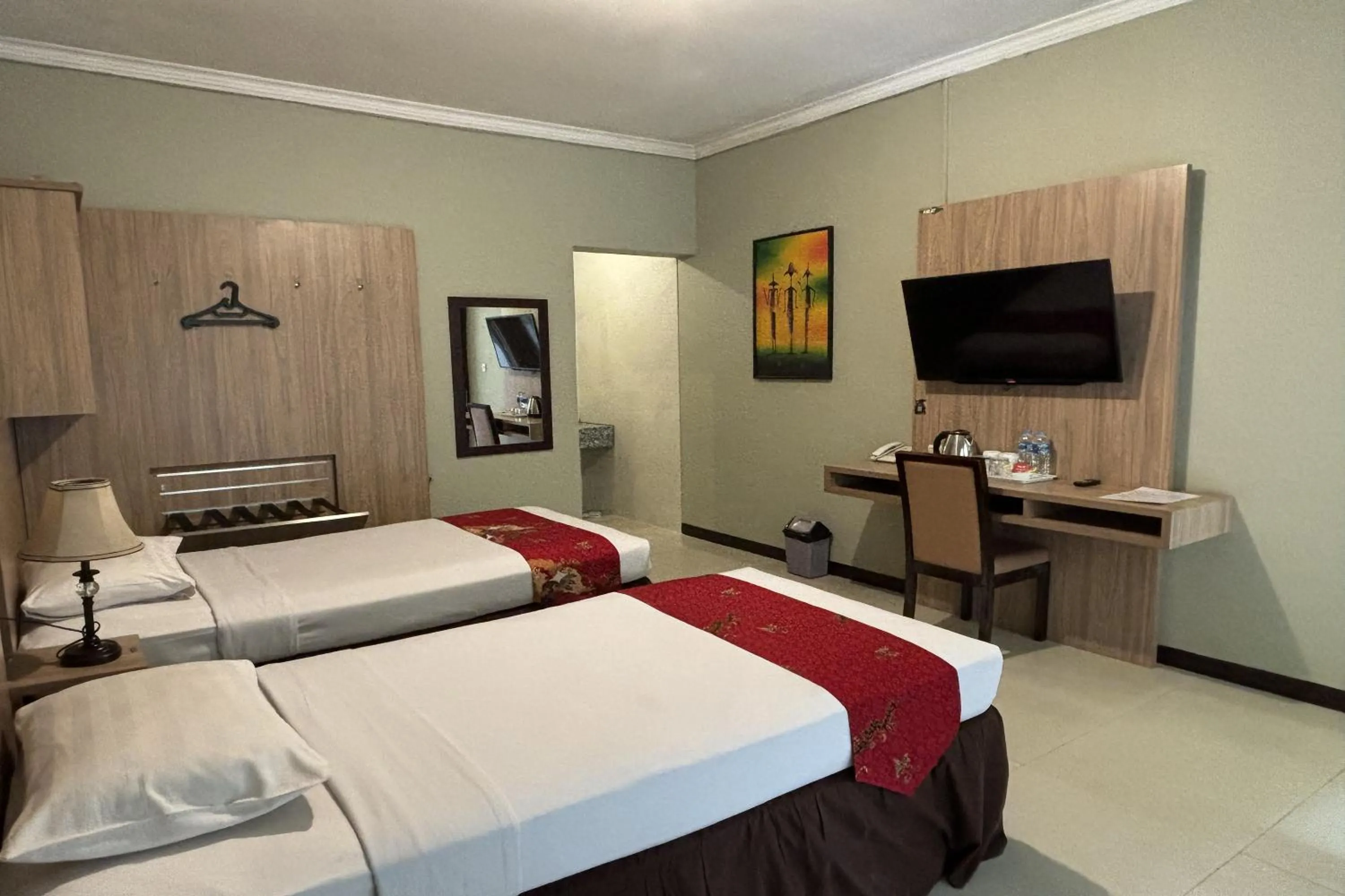 Bed in Hotel Pesona Bamboe Lembang
