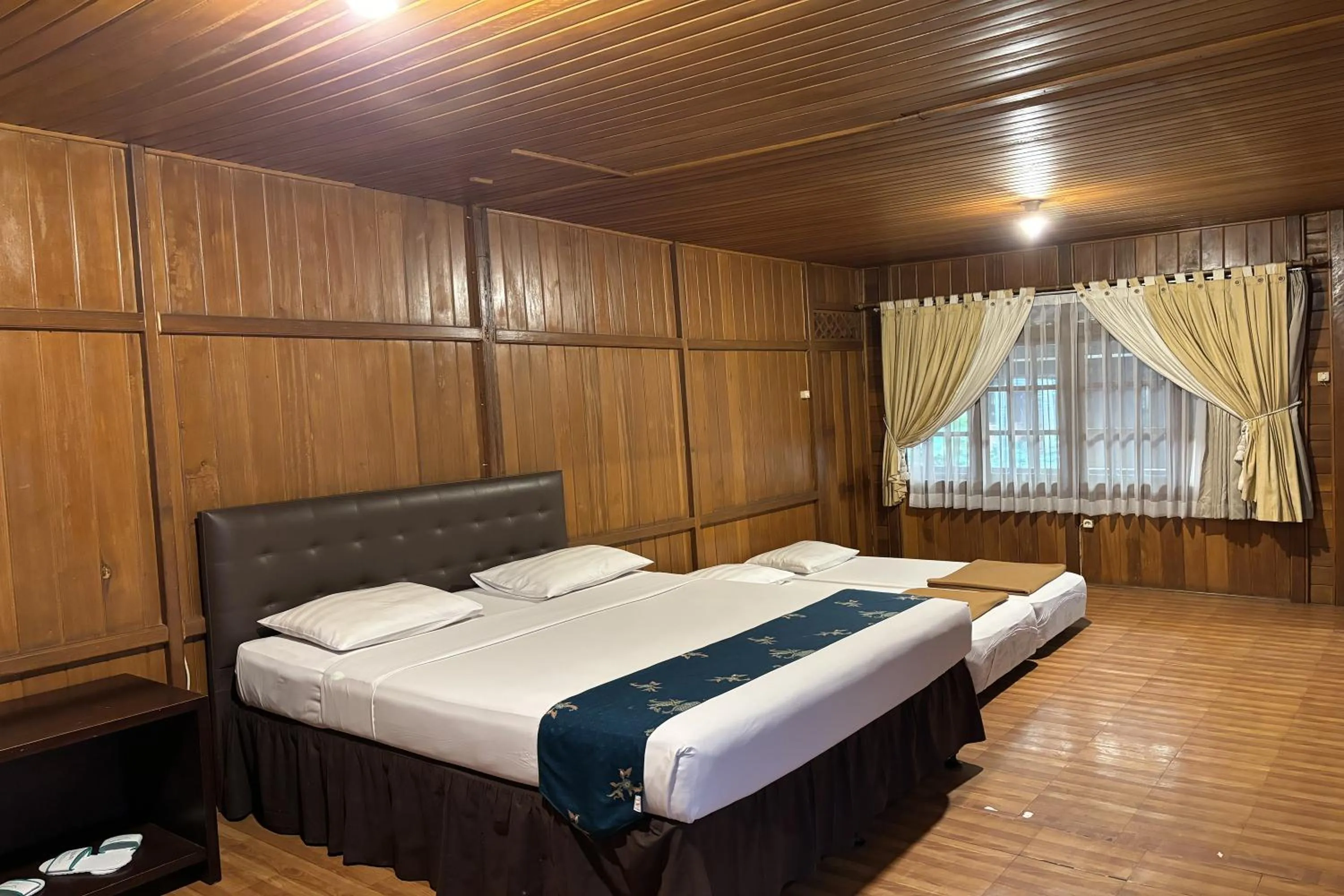 Bed in Hotel Pesona Bamboe Lembang