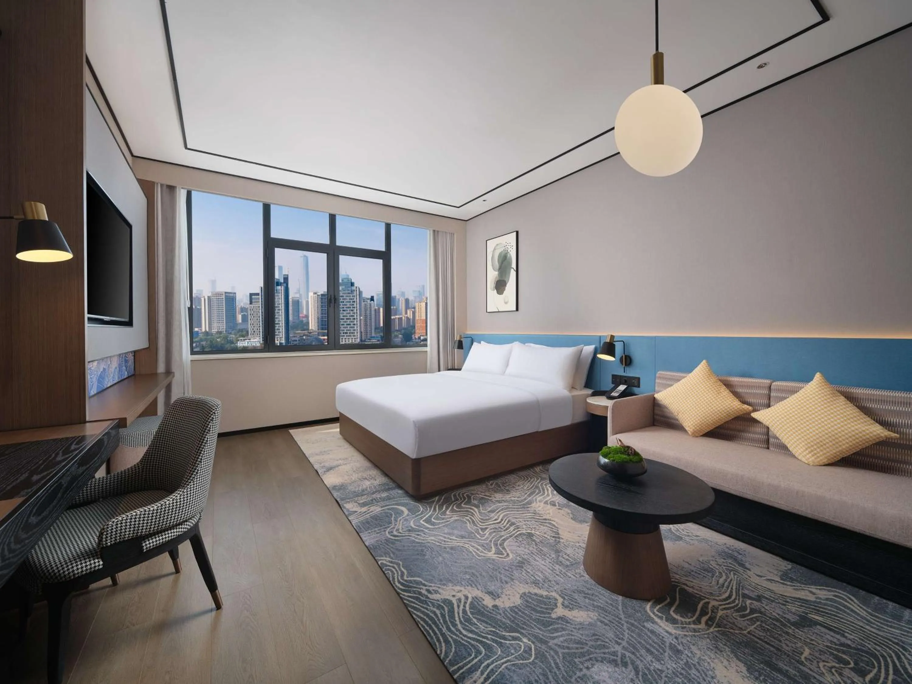 Living room, Bed in Hilton Garden Inn Ji'Nan High-Tech Zone