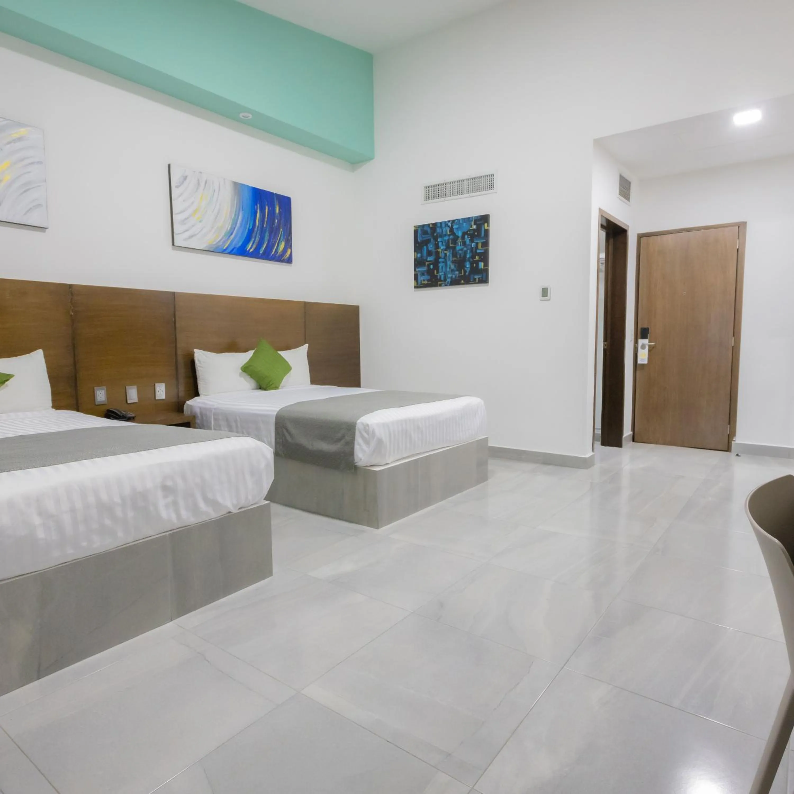 Photo of the whole room, Bed in Solamar Inn Mazatlan