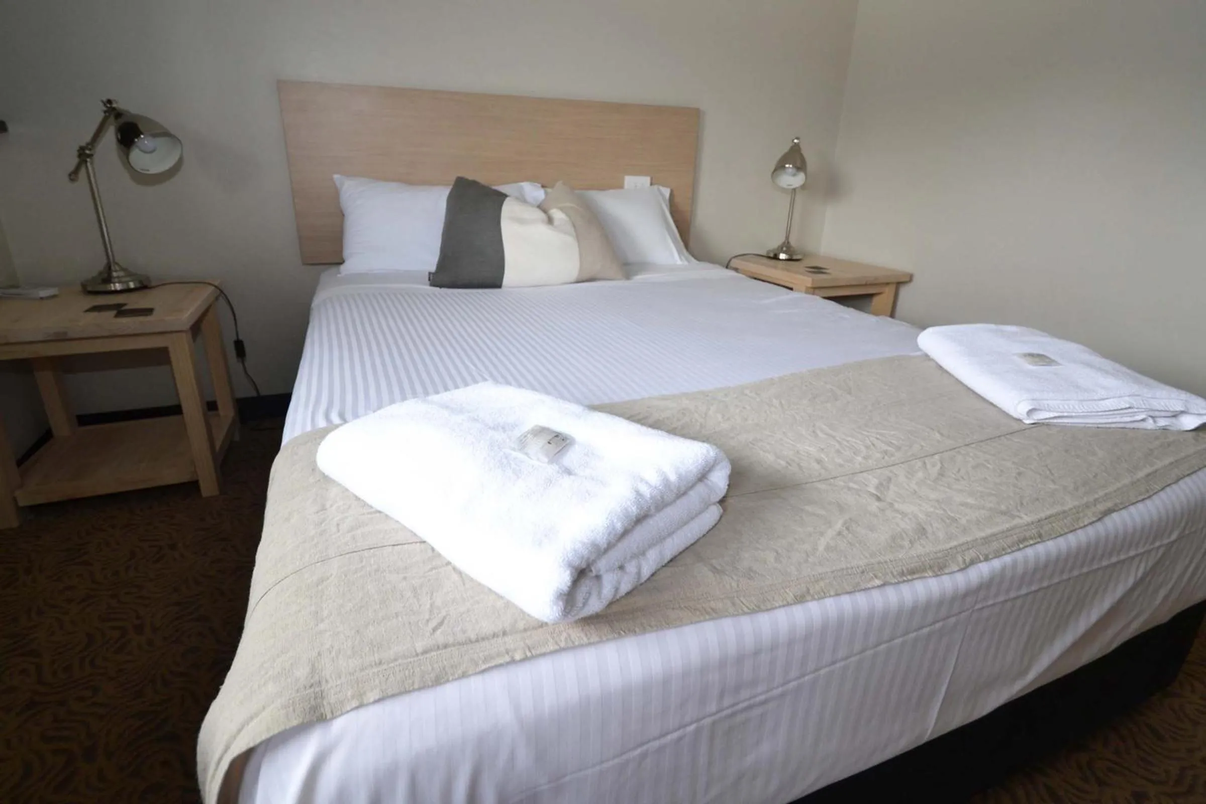 Bed in Crossroads Hotel