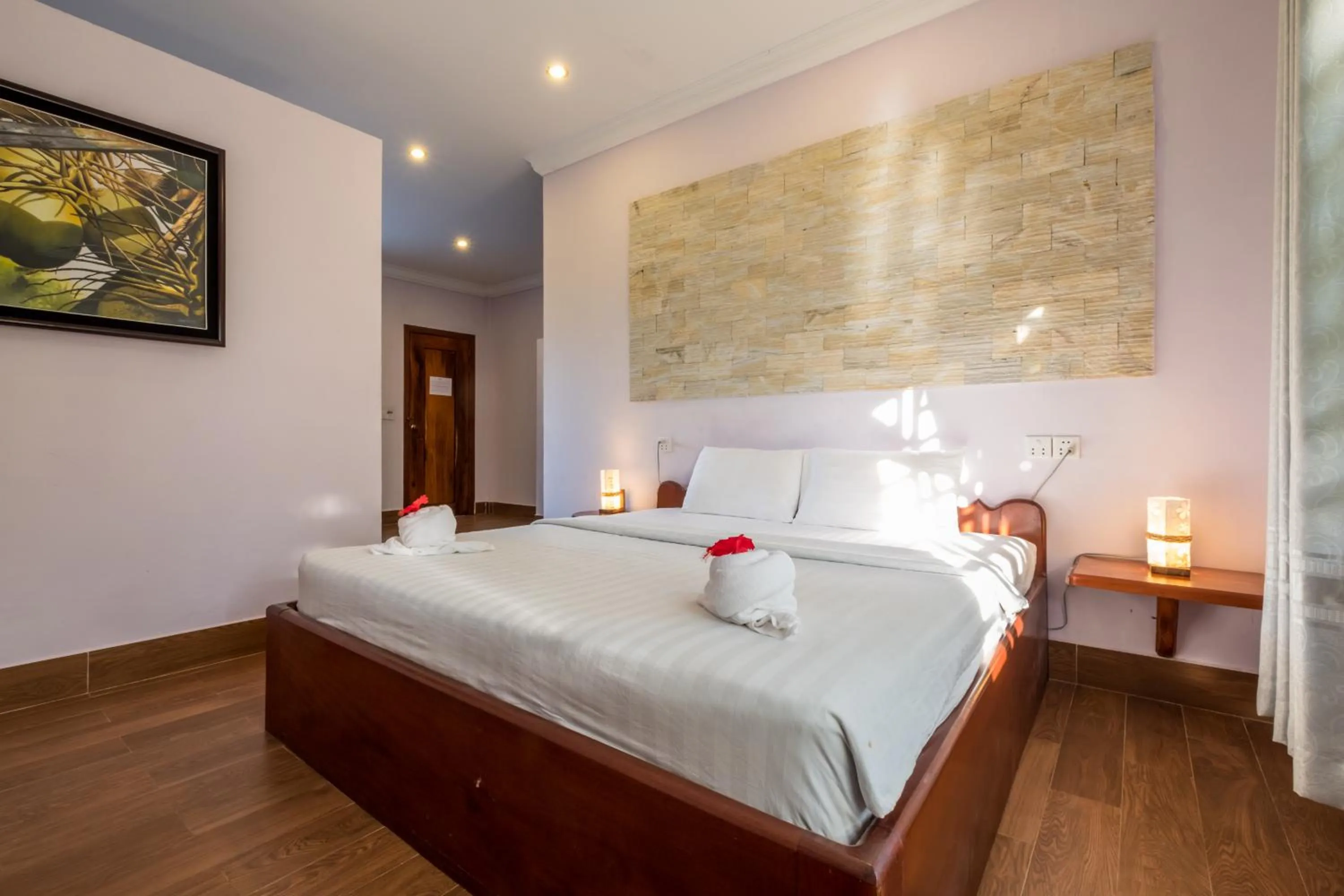 Bed in Kep Bungalows