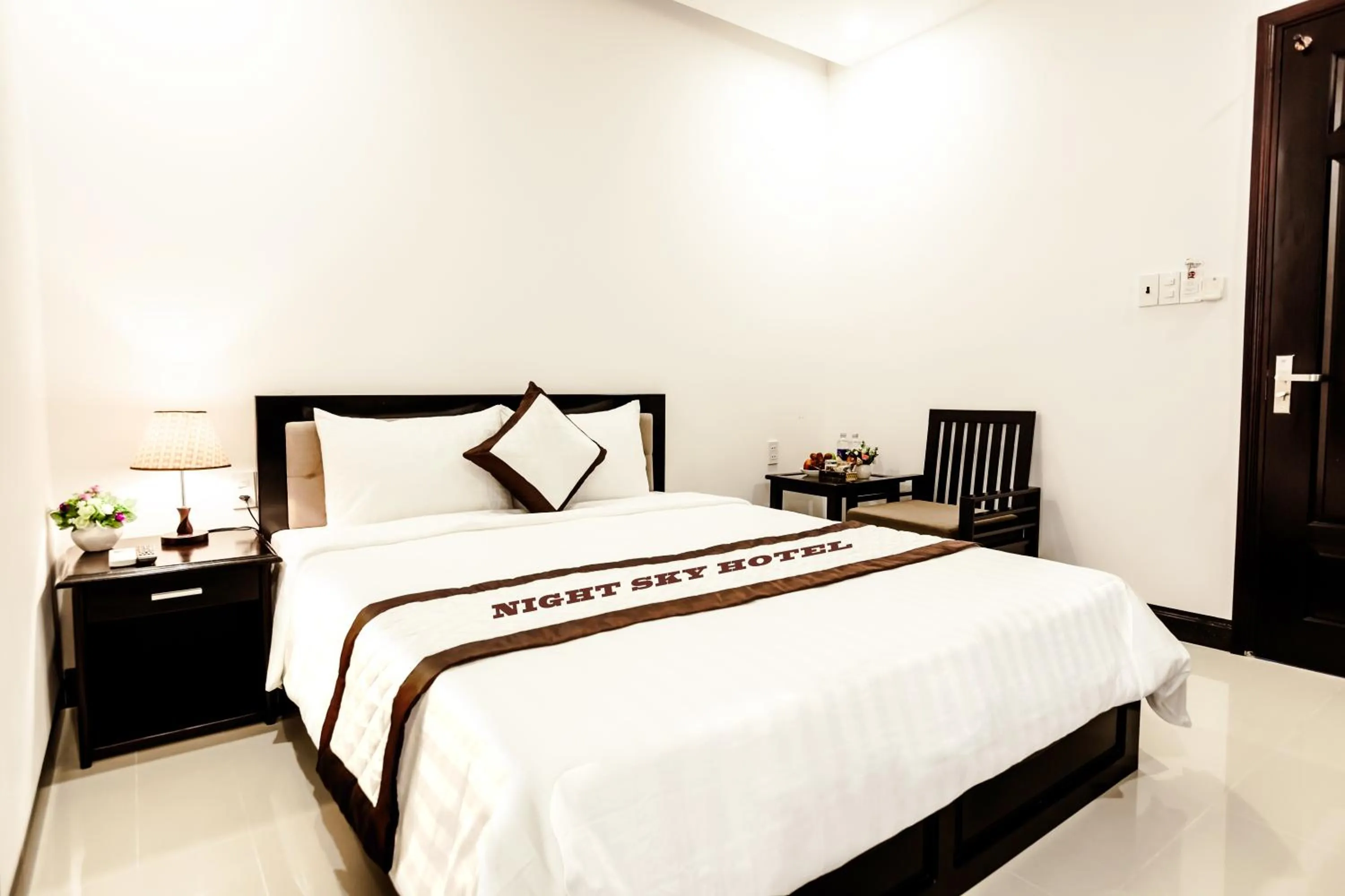 Bed in Night Sky Hotel