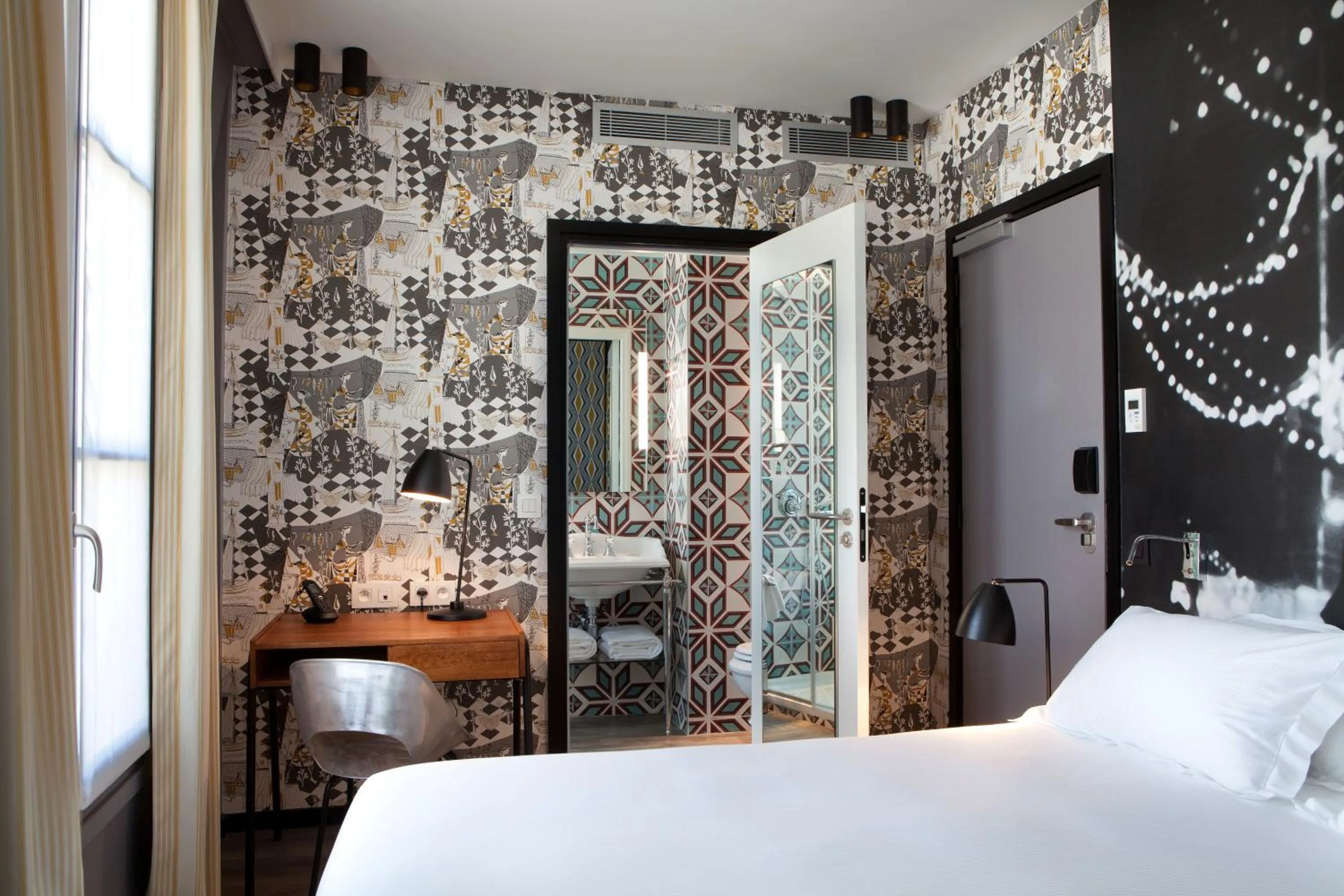 Bed in Hotel L’Antoine