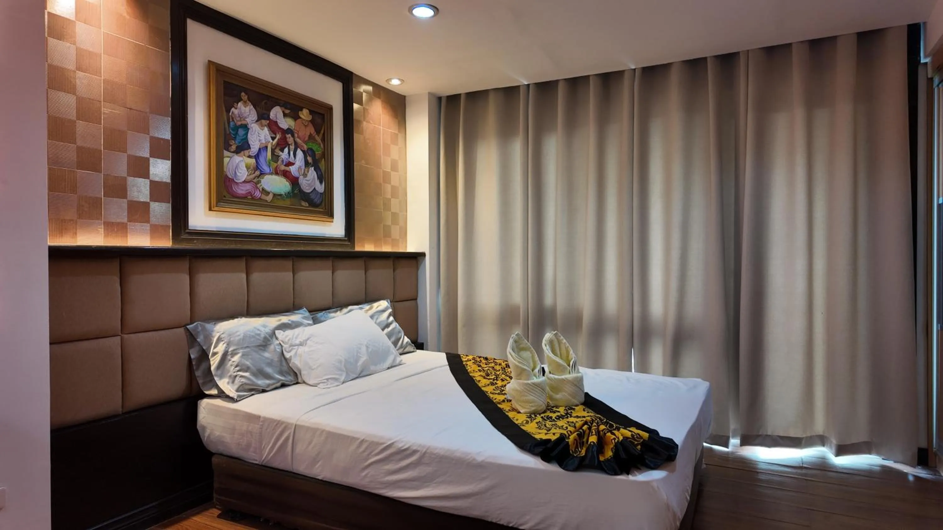 Bed in Kay Hotel and Residences