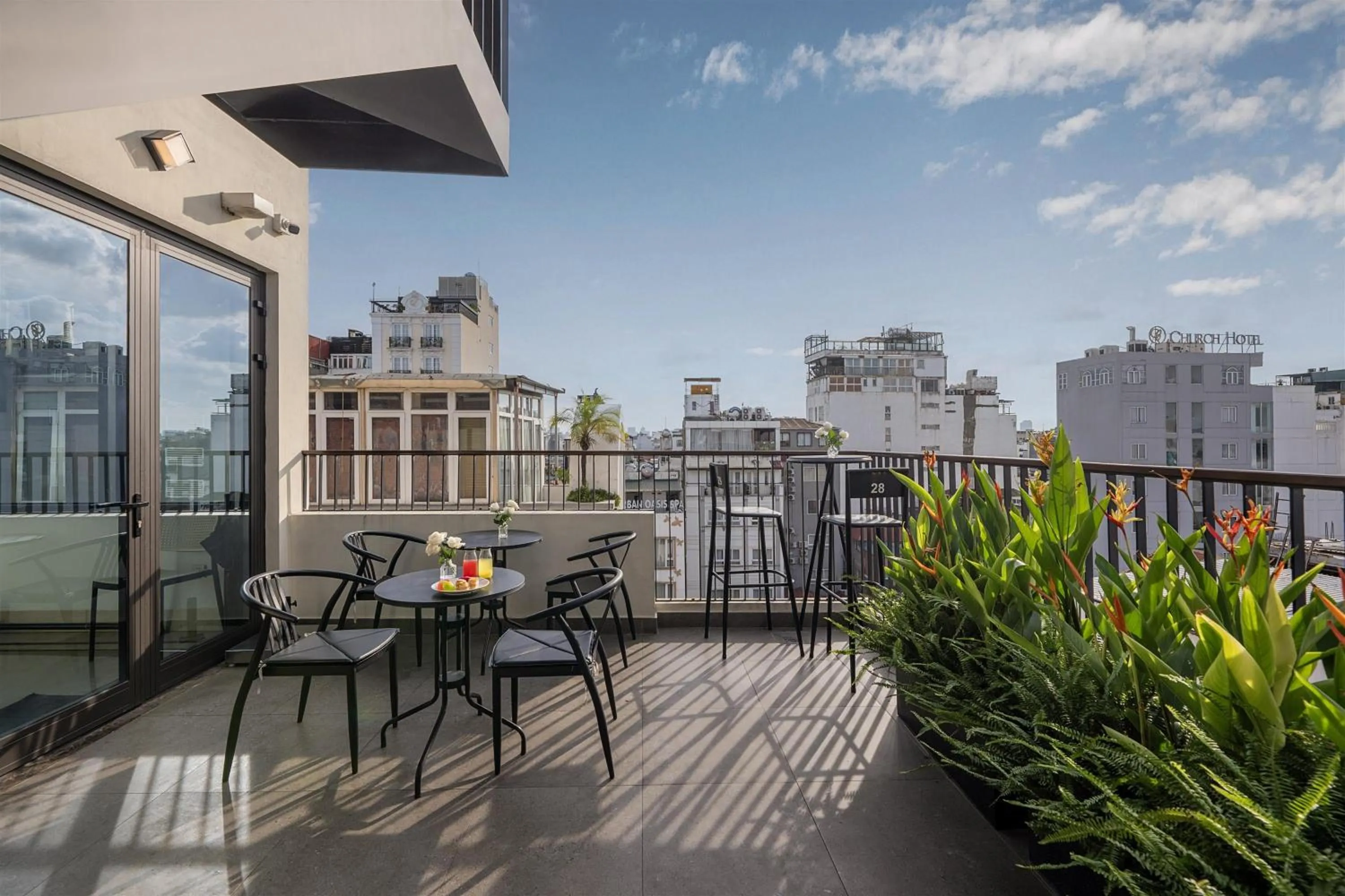 Property building in Le Premier Hotel & Rooftop Bar