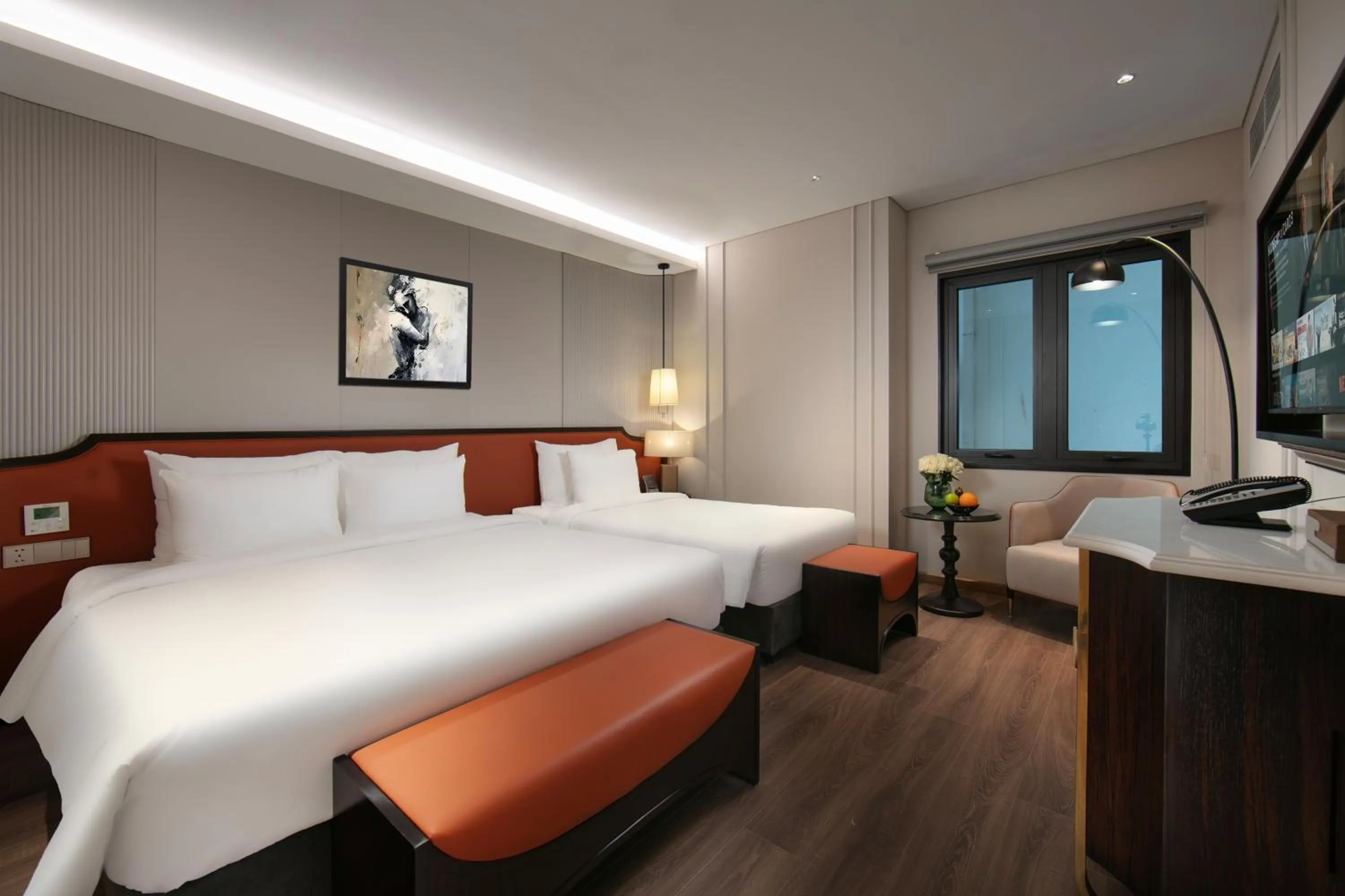 Bed in Le Premier Hotel & Rooftop Bar