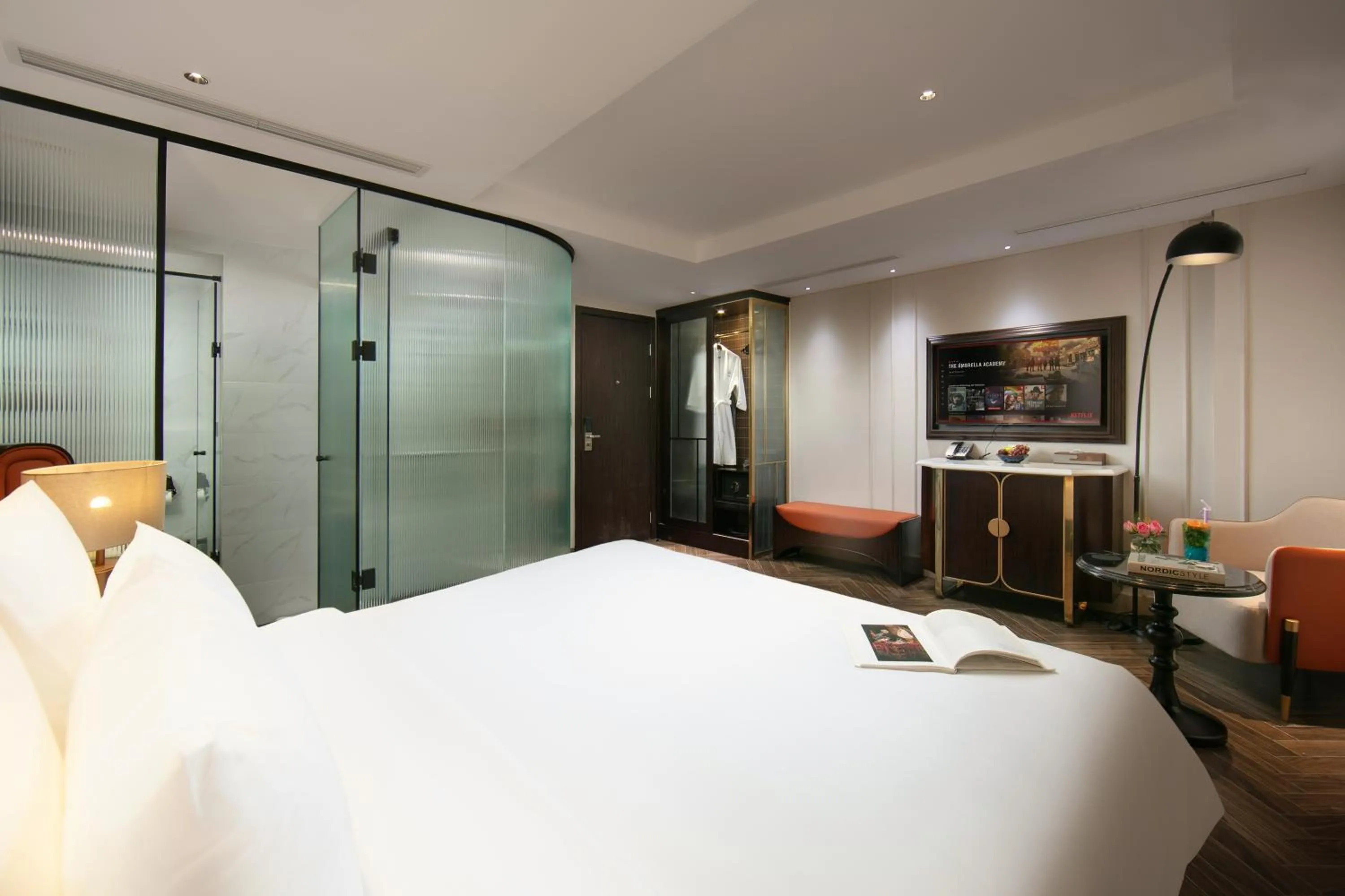 Bed in Le Premier Hotel & Rooftop Bar